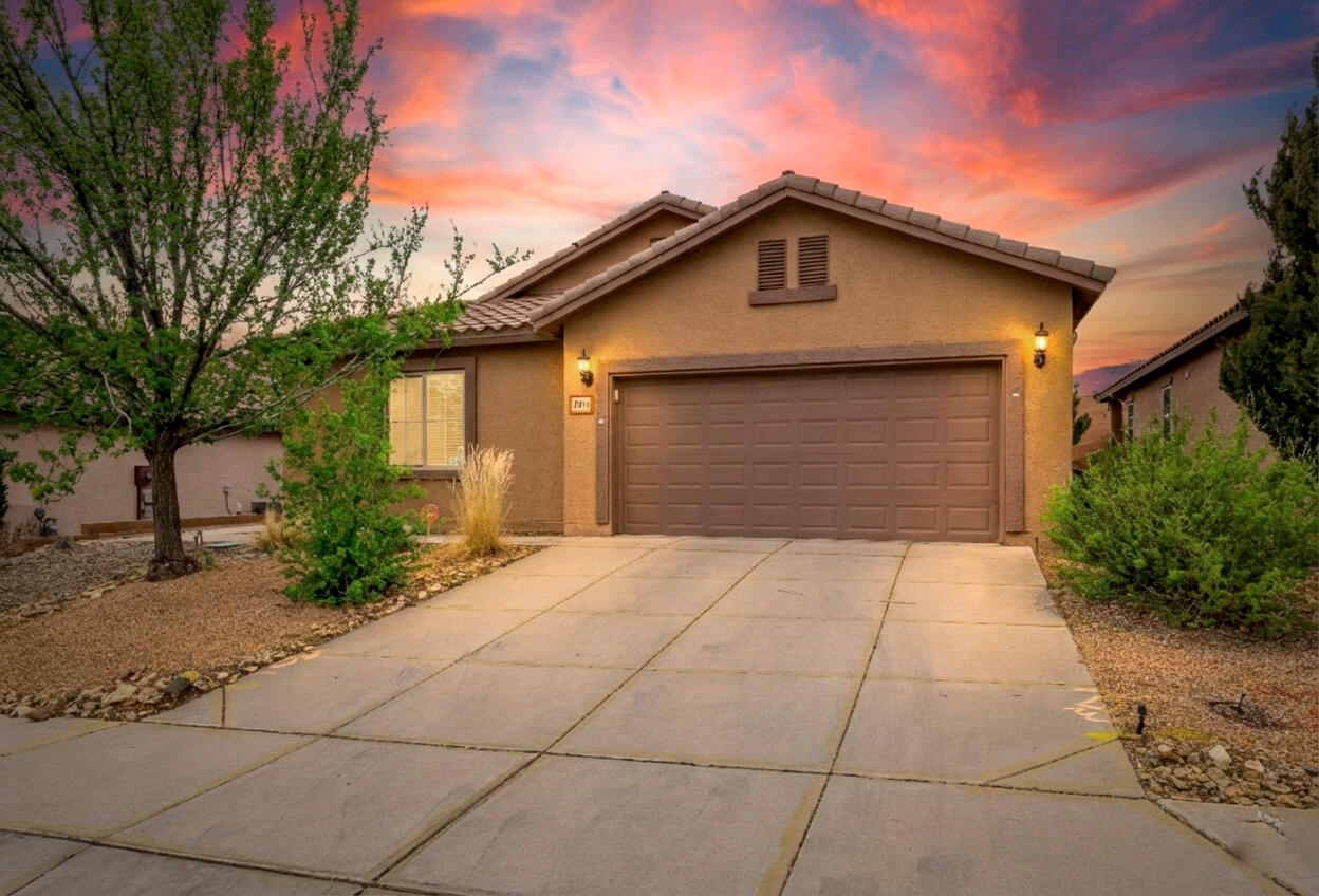 Nestled in prestigious Loma Colorado, this 2,300-square-foot, four-bedroom sanctuary pairs a sophisticated open floor plan and an extended pergola-covered patio with a rare position backing onto the community's largest open space. The culinary hub is beautifully appointed with solid-surface countertops, premium appliances, a four-seat social island, and a dedicated dining area. Outside, the professionally landscaped grounds offer a refined alfresco retreat. The primary suite serves as a masterfully private haven featuring a spa-inspired bath and an expansive walk-in closet. Complete with three additional bedrooms, a two-car garage, and proximity to Rio Rancho's premier amenities, this residence offers a lifestyle of seamless indoor-outdoor luxury