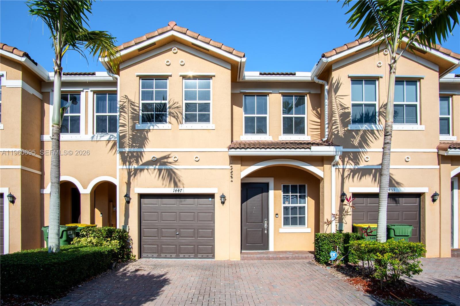 Welcome to this beautiful 4-bedroom, 3-bath home in the sought-after gated community of Palm Cove. Featuring a convenient first-floor bedroom and full bath, tile flooring downstairs, and wood laminate upstairs, this home offers both comfort and functionality. Residents enjoy access to a community pool and playground, all with a low HOA fee. Ideally located near Baptist Hospital, the Turnpike, and the Florida Keys. A perfect blend of location, space, and security, schedule your showing today!