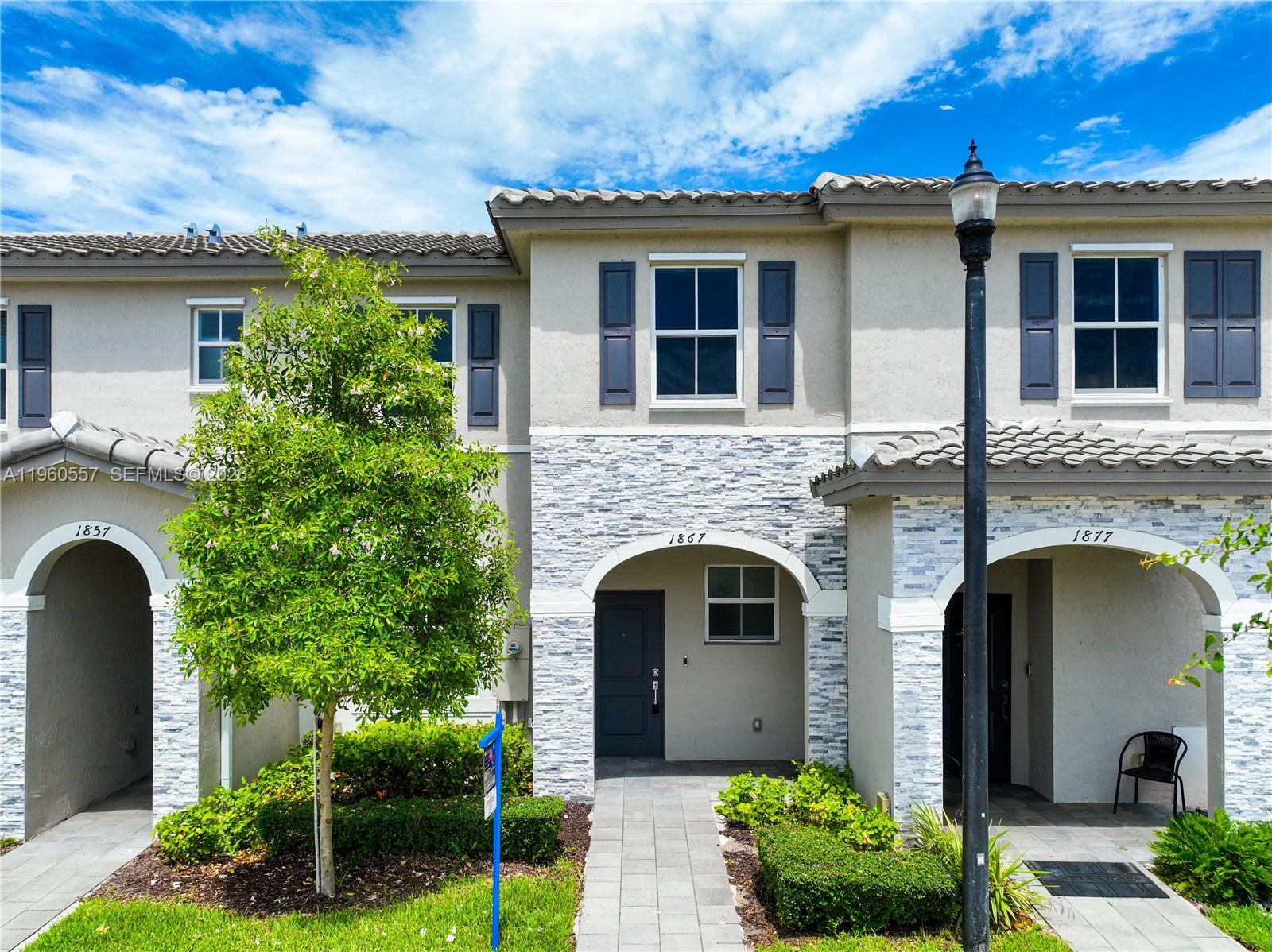 Charming 3BD/2.5BA townhome located in the Riviera at Keys Gate. The main level features an open living and dining area that flows into the kitchen—perfect for gatherings. Kitchen includes stainless steel appliances, plenty of storage, and a breakfast counter. Half bath and laundry are conveniently downstairs. Upstairs offers a large primary bedroom with walk-in closet and private bath, plus two additional bedrooms and a full hallway bath. Enjoy a fenced-in backyard for privacy. Amenities include clubhouse, pool, gym, and nearby parks. Minutes to shops, restaurants, schools, and the Florida Keys. Low HOA. View the 3D tour!