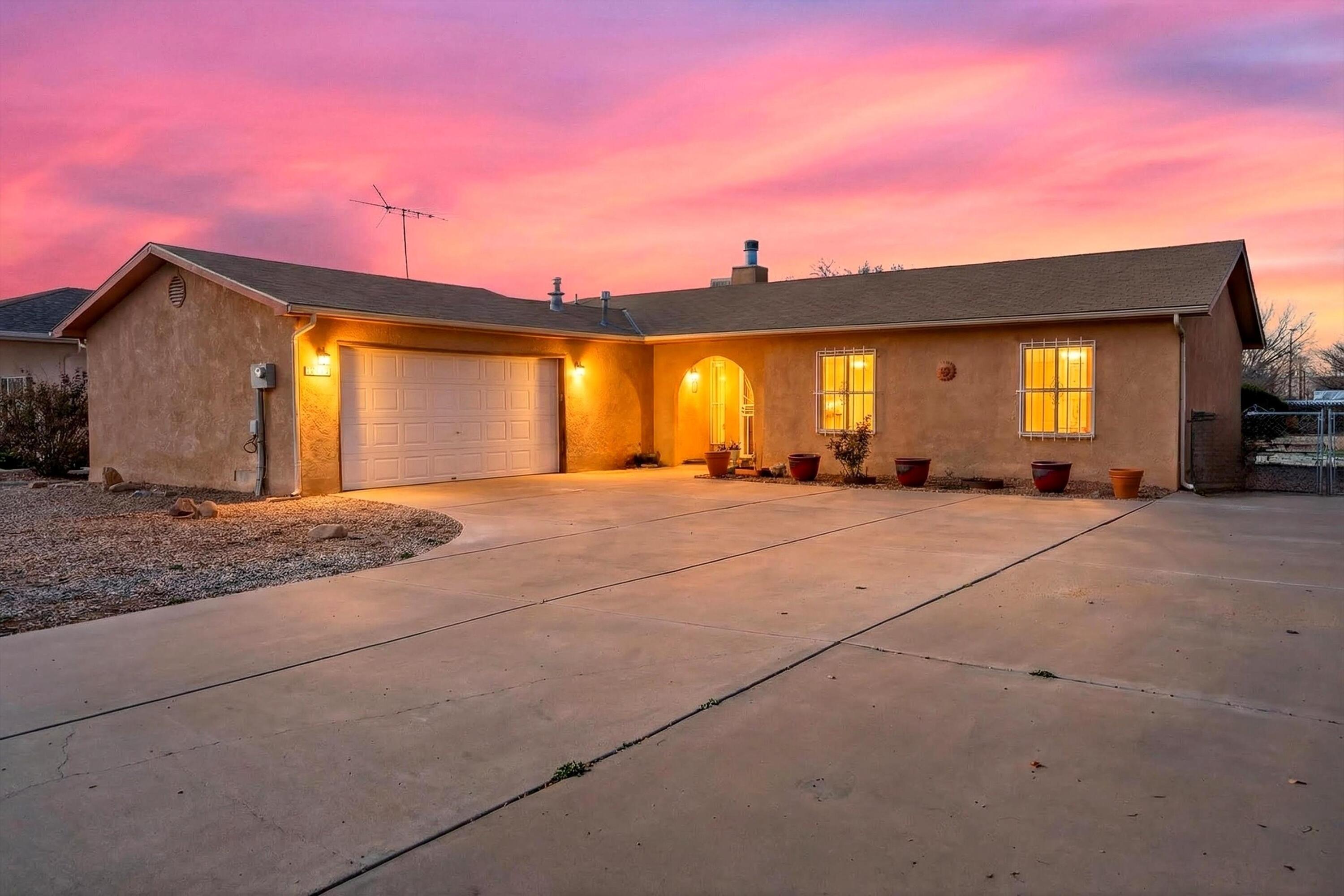 Welcome home to this beautifully maintained single-story gem in Southwest Albuquerque! This inviting 3-bedroom, 2-bath residence offers comfortable, easy living with a functional floor plan and pride of ownership throughout. The spacious living areas flow effortlessly, making it perfect for everyday living and entertaining. Step outside to a covered back patio overlooking a large backyard, ideal for gatherings, gardening, or relaxing evenings, complete with a storage shed for added convenience. The 2-car garage provides ample parking and storage. Located in a well-established area of SW Albuquerque, this home offers space, comfort, and value -- a wonderful opportunity you won't want to miss!