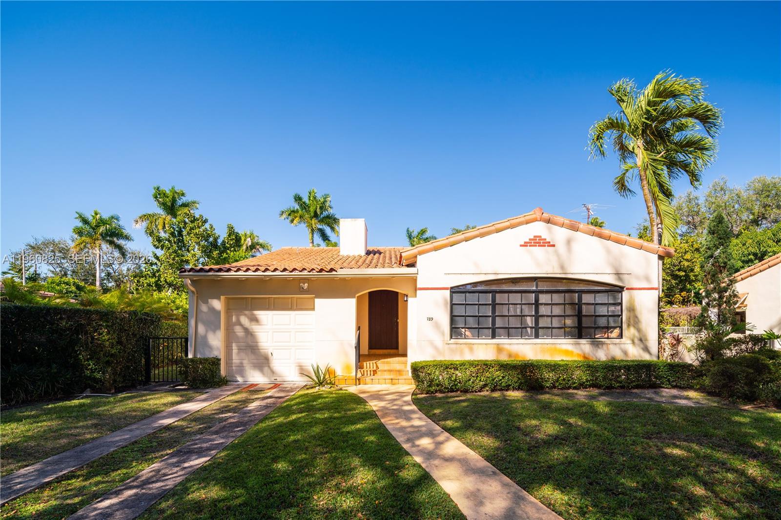 First time on the market in 47 years. Historically designated vintage late 1930's home in a prestige location in Coral Gables' Golden Triangle neighborhood walking distance to the Biltmore Hotel and Golf Course. Originally permitted in 1937 and designed by the esteemed architects, John and Coulton Skinner it is a refined and early representation of the Mediterranean Transitional style according to the Historic Preservation Board of Coral Gables. The lot is more than a double lot at 10,425 square feet (75 X139). Original hand-pegged wide plank oak floors are intact. The original pecky-cypress cathedral ceilings remain in perfect, unpainted condition. The large Florida room has original quarry tile floors. Original, wood-burning fireplace. Formal dining room has view out to a very expansive back yard. All rooms are unusually large. This home offers that rare chance to buy in one of Coral Gables' top neighborhoods close to the Biltmore Hotel, Venetian Pool, Coral Gables Library and Youth Center on a large lot with an ultra-charming vintage home which may qualify for the Miami Dade historic homes ad valorem tax credits. 1699 Living area sq ft and 2029 sq ft under roof. Complete set of photos to come soon. Floor plan available. 23-page Historic Designation Report is an attachment here on MLS.