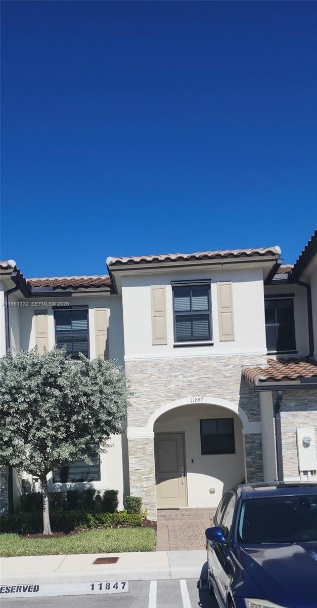 Welcome to this beautifully maintained 4-year-old home located in the desirable community of Villa at Corisca. This open-concept layout features 3 spacious bedrooms and 2 full bathrooms. Tile flooring enhances the main living areas on the first floor, while the upstairs bedrooms offer cozy carpeted floors. The kitchen is equipped with stainless steel appliances and ample storage. Parking is conveniently located directly in front of the unit. Ideally located near shopping, restaurants, and nearby schools. **Tenant occupied—please do not disturb tenants. Showings by appointment only. Lease expires July 2026**.