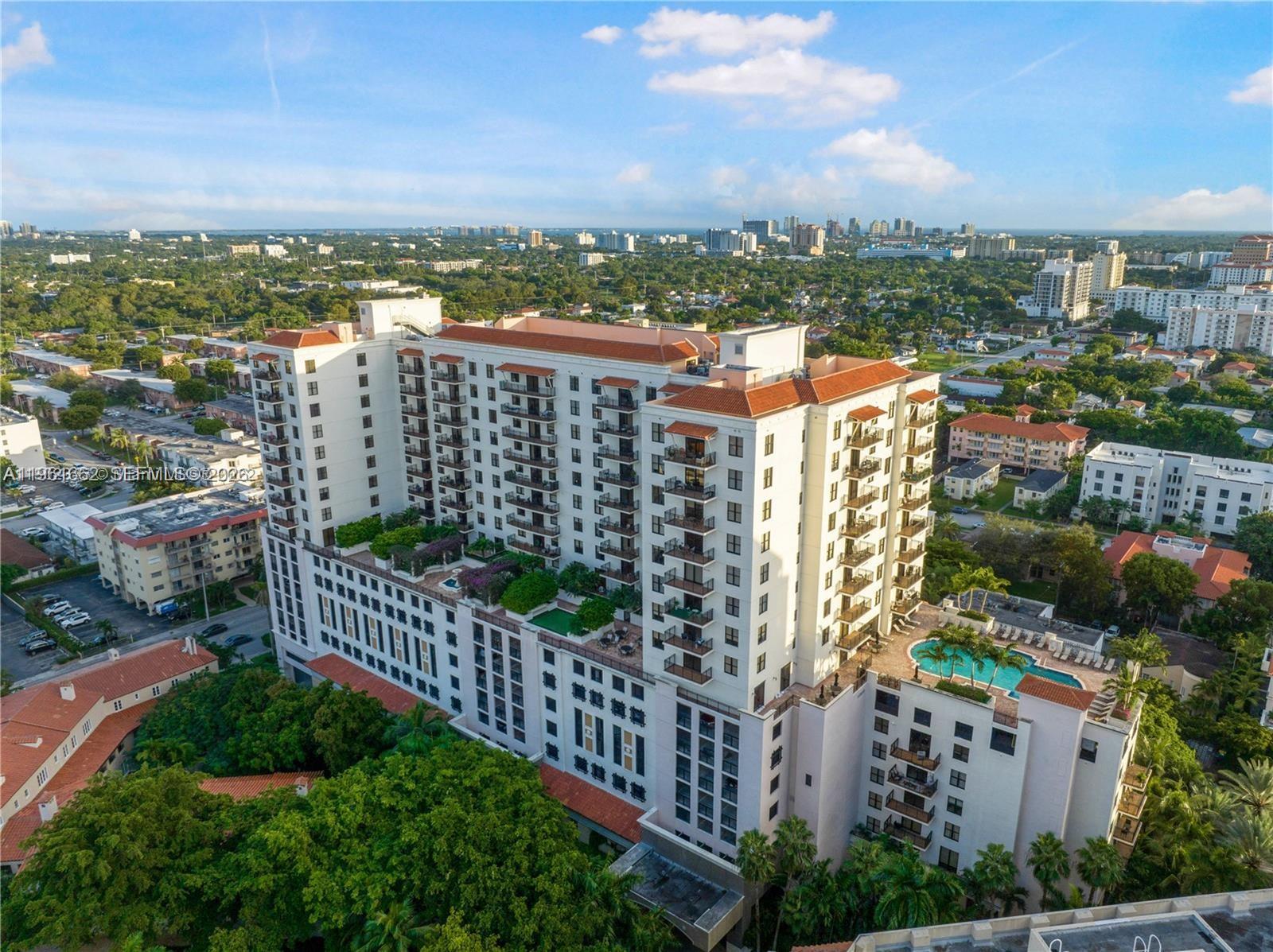 Spacious and beautiful 2 bedroom, 2 bathroom residence featuring granite countertops, stainless steel appliances, a walk in closet, and in unit washer and dryer. Enjoy exceptional 5 star resort style amenities including an elegant grand lobby with concierge services, a beautifully designed pool, fitness center, spa and sun deck, clubhouse, business center, putting green, and valet parking. Located at Puerta de Palmas, a landmark building at the historic Douglas Road entrance of Coral Gables. Perfectly located minutes from Miracle Mile, Brickell, and Downtown, this residence offers effortless access to the best dining, shopping, and culture Coral Gables has to offer.