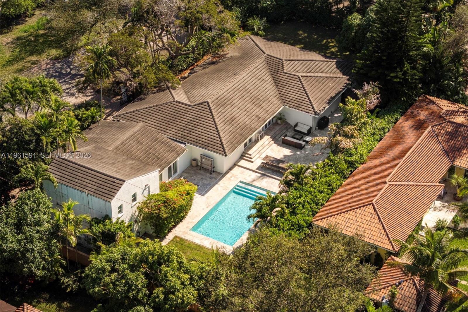 Ideally located at the gateway to Coral Gables, on one of the city's most scenic, glorious streets, 1101 Coral Way sits on an expansive corner lot and offers abundant space for both indoor and outdoor living and entertaining. The home features tons of updates including a new pool and patio, updated bathrooms, 2021 roof, newly-installed kitchen cabinets and more. This home is where an excellent, central location meets private living: the double driveway entrance is set on a quiet side street just one block from Salvadore Park and minutes from Miracle Mile, dining, shopping and top schools. A separate, upstairs 1-bed/1-bath apartment provides exceptional flexibility for guests, extended family, or a private office retreat.