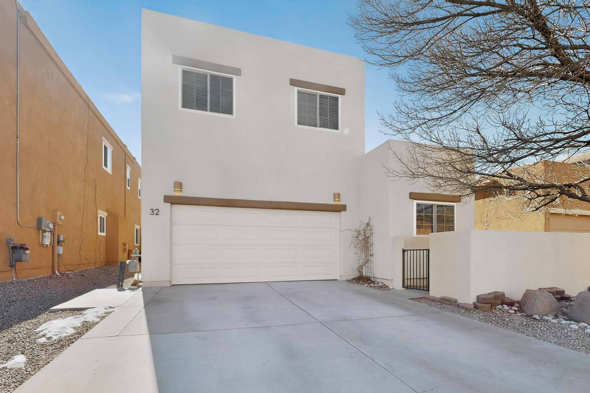 This beautiful home located at 32 Sunset Canyon Lane in Santa Fe offers an exceptional living experience with spacious bedrooms designed to provide comfort and privacy for every member of the household. One of the standout features is the convenient bedroom and full bathroom situated on the main floor, making it ideal for guests, multi-generational living, or those who prefer single-level living without sacrificing space. The open kitchen is a true centerpiece of the home, featuring natural light , creating a warm and inviting atmosphere perfect for family gatherings, entertaining friends, or simply enjoying everyday meals.