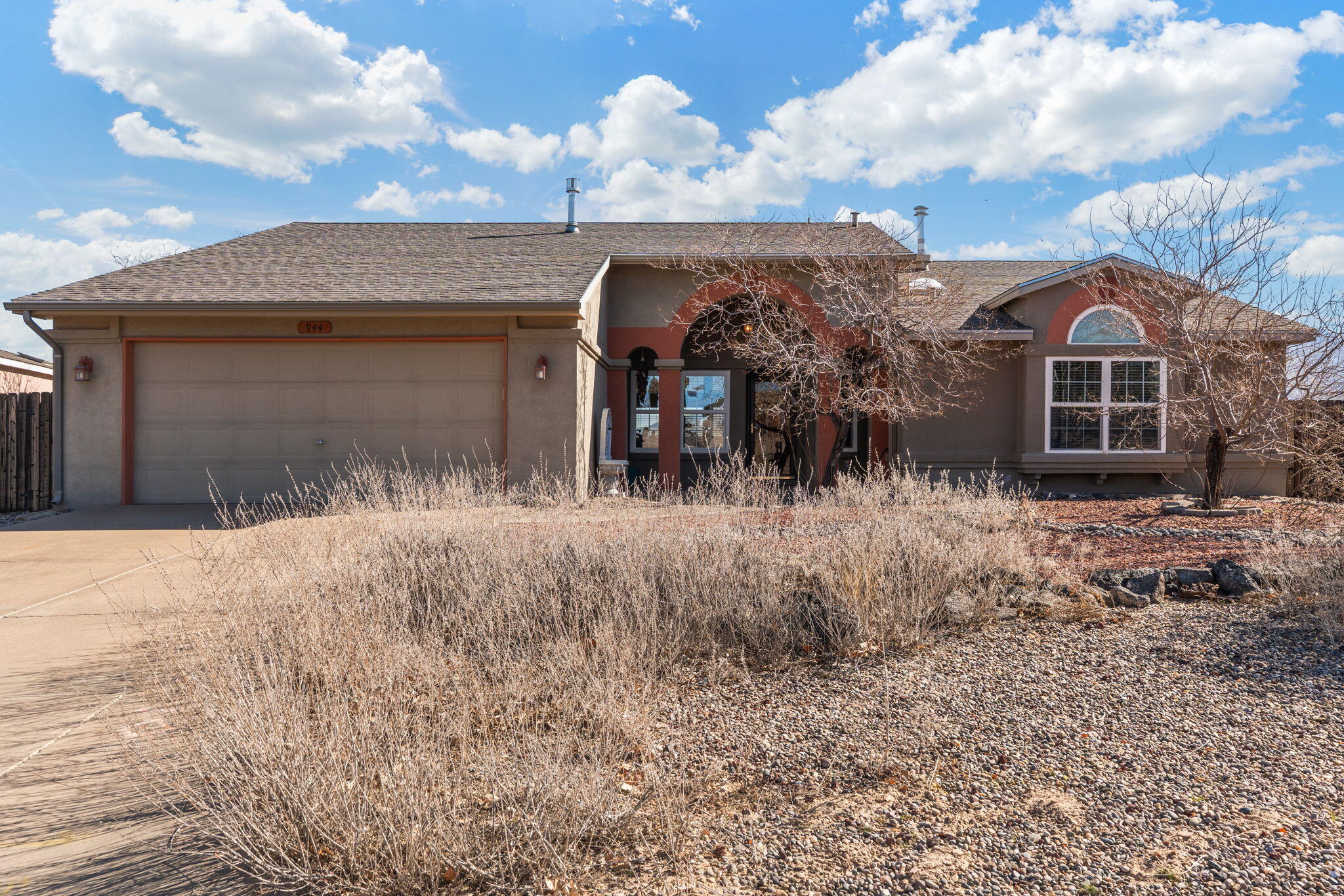 Experience stunning million-dollar views from this beautifully maintained single-story home located at 944 Canvasback Rd, Rio Rancho. This charming residence boasts an open floorplan that is flooded with natural light, creating a warm and inviting atmosphere throughout the entire living space. The thoughtfully remodeled kitchen features elegant granite countertops, ample cabinet space, and modern appliances, making it perfect for both everyday living and entertaining guests. Cozy up during cooler evenings by the inviting fireplace in the spacious living room, which also offers breathtaking panoramic views that can be enjoyed year-round.