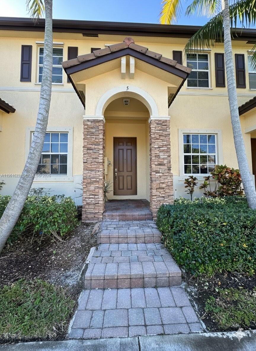 Welcome to this well-maintained 2BR/2.5BA townhouse in The Shores at Cutler Bay. The upper level features two spacious bedrooms, each with a private bath and walk-in closet, plus an in-unit washer/dryer conveniently located upstairs. The main level offers an open-concept layout with a modern kitchen overlooking the dining area—ideal for everyday living and entertaining. Enjoy a cozy, private backyard perfect for relaxing or hosting small gatherings.Residents enjoy full access to Isles at Bayshore amenities, including pool, gym, kids’ playground, and party room. The community is well maintained and known for its strong sense of community, hosting holiday events and food truck nights throughout the year. Two assigned parking spaces plus ample guest parking. Conveniently located near shopping, dining, and public transportation.