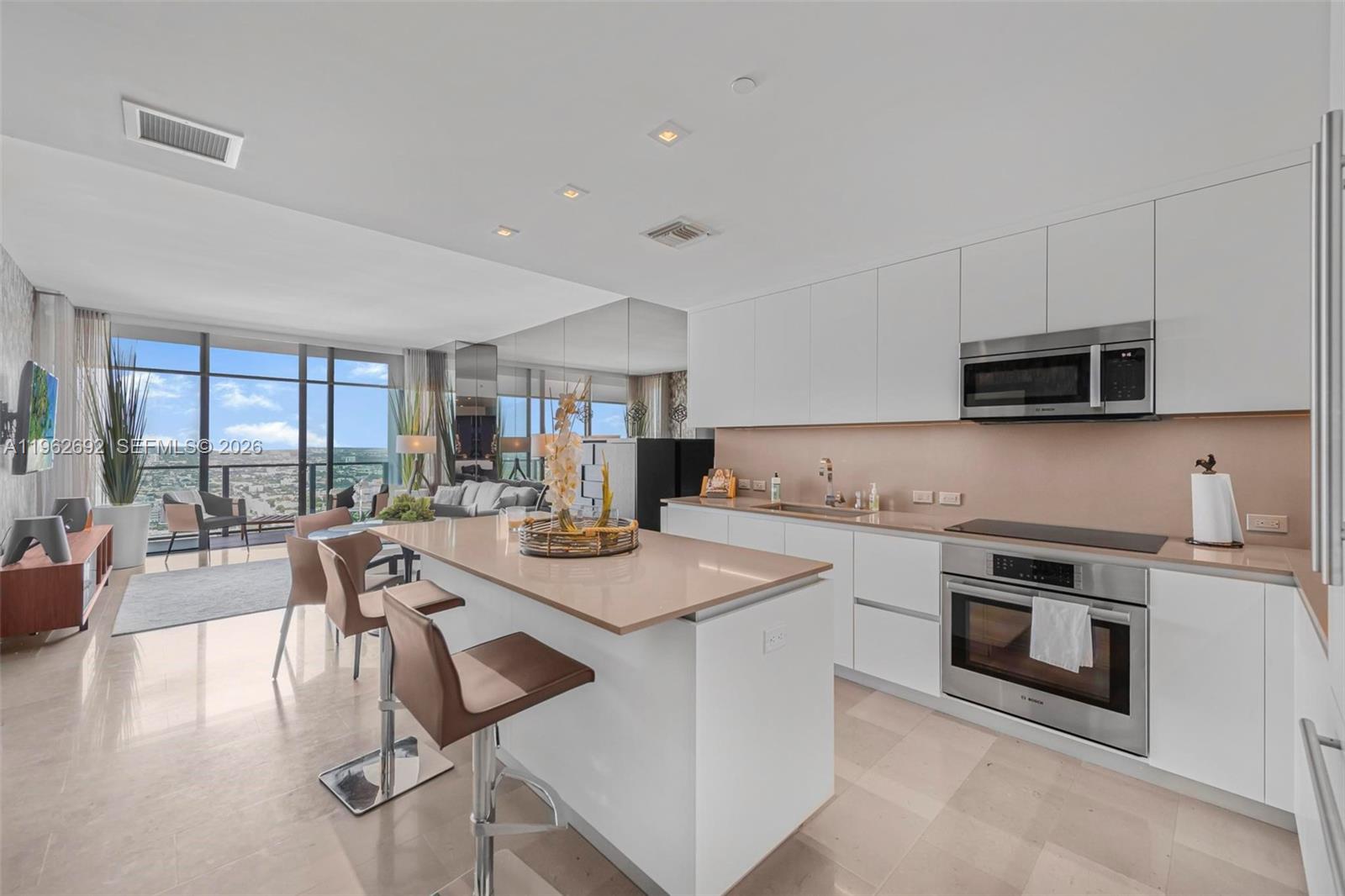 Ready to move in exceptional unit professionally furnished and decorated by Stephen G, in the heart of Brickell City Center with direct access to exclusive shopping mall. Amazing panoramic city and sunset views enjoyable from floor to ceiling windows. Ideal open layout floorplan, Italkraft kitchen cabinetry and stainless steal Bosch appliances. Amenities include indoor/outdoor fitness center, 2 swimming pools (pool service), BBQ grill, pergola, Hammam spa, state of the art children's playroom, party room, business center, 24 hour concierge.