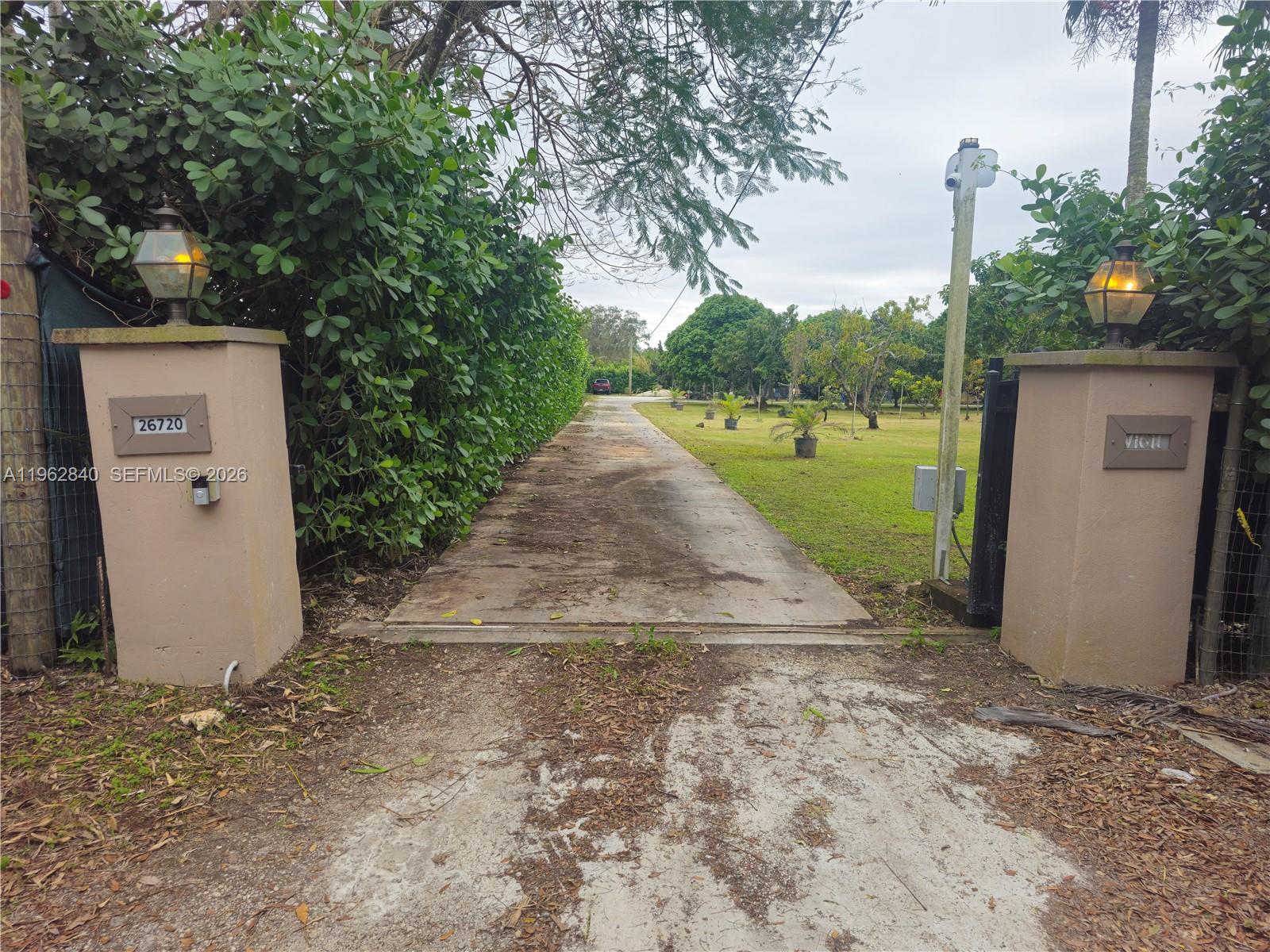 One of a kind property.  This detached guest home is located on a 2.5 acre gated estate and with its own separated driveway and gated, private entry with cover two car carport and large screened patio.  Inside you will find an open floor plan, everything inside was completely remodeled 3 years ago. oversized bathroom, as well as bedroom with wall to wall closet,  property even comes with an enormous laundry room, for those needing extra storage space. Rental price includes internet, filtered water.  First plus one month security with acceptable credit.