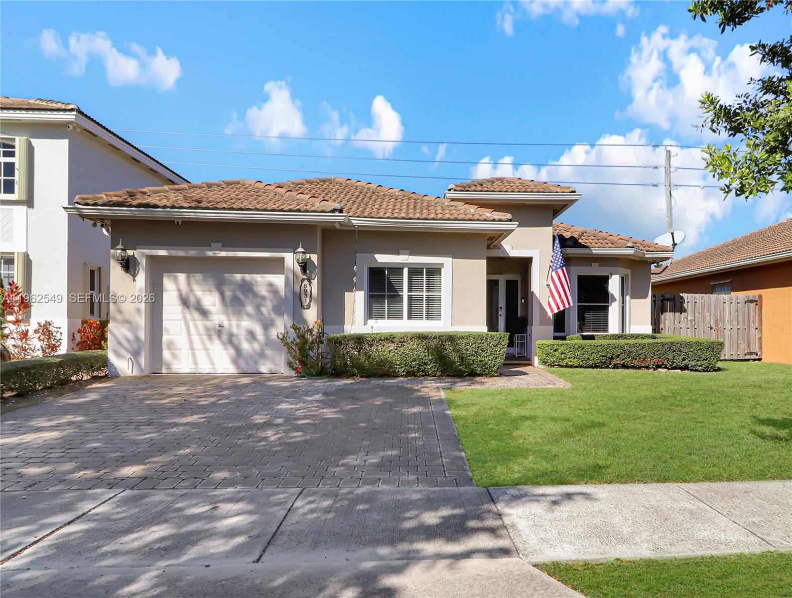 This turnkey residence in the heart of Cutler Bay is ready for you to move right in and start enjoying the South Florida lifestyle. The home seamlessly blends modern upgrades with a prime location, featuring sleek tile flooring throughout the spacious living areas and stylish wood-like flooring in the bedrooms for a warm, contemporary feel. Peace of mind comes standard with high-impact windows and doors installed throughout, ensuring both security and energy efficiency. The interior is further enhanced by updated bathrooms with premium modern finishes that create a spa-like atmosphere. Step outside to find a spacious backyard with plenty of room for a pool, perfect for creating your own private outdoor oasis. You'll love the convenience of having Publix and everyday shopping just moments away, along with quick access to the Florida Turnpike and Black Point Marina. Plus, you are perfectly positioned to enjoy the highly anticipated Legacy Park and Municipal Complex coming soon to the area.