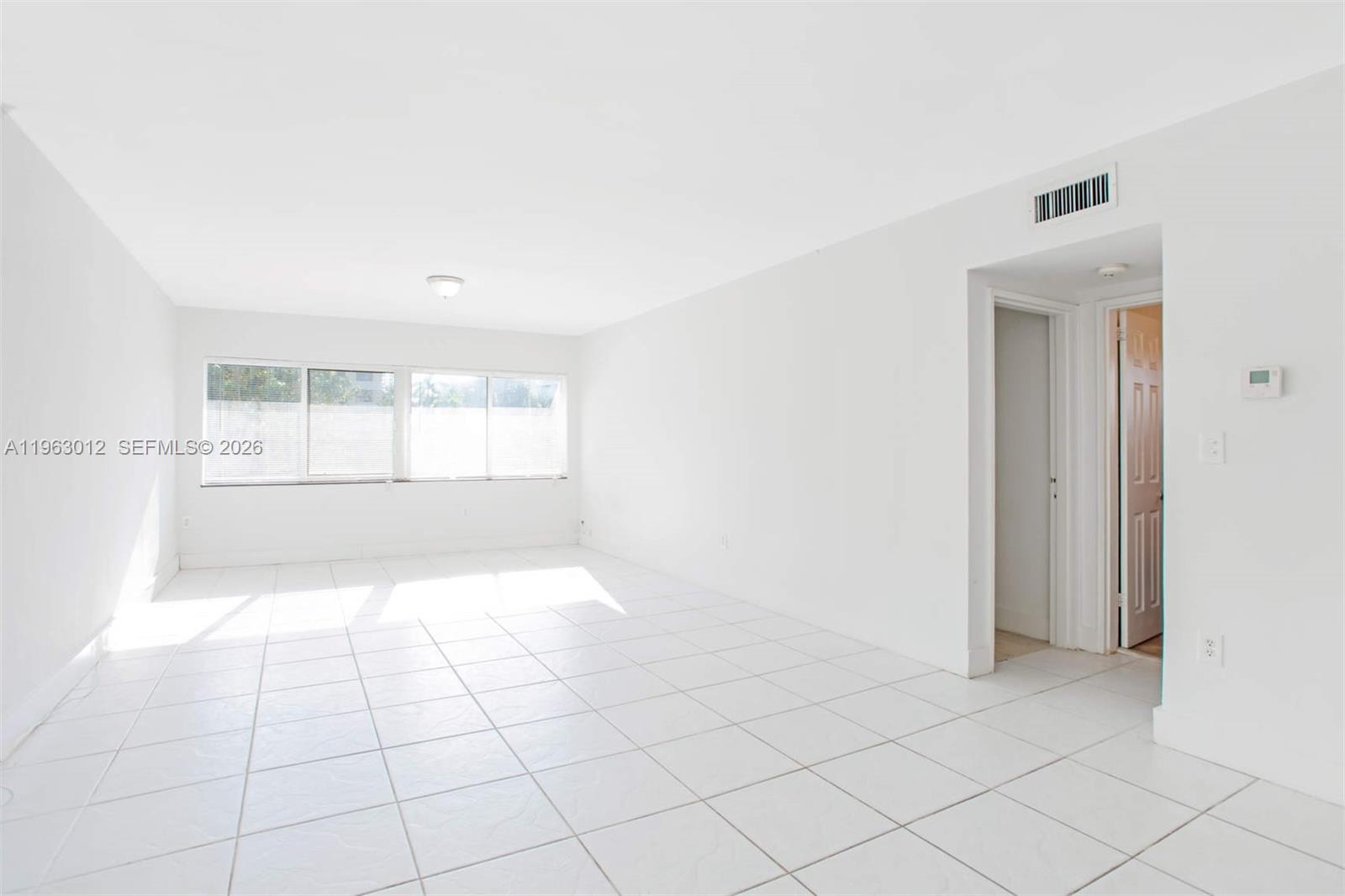 Open-concept living area at 10001 Bay Harbor Dr - Condo in Bay Harbor Islands