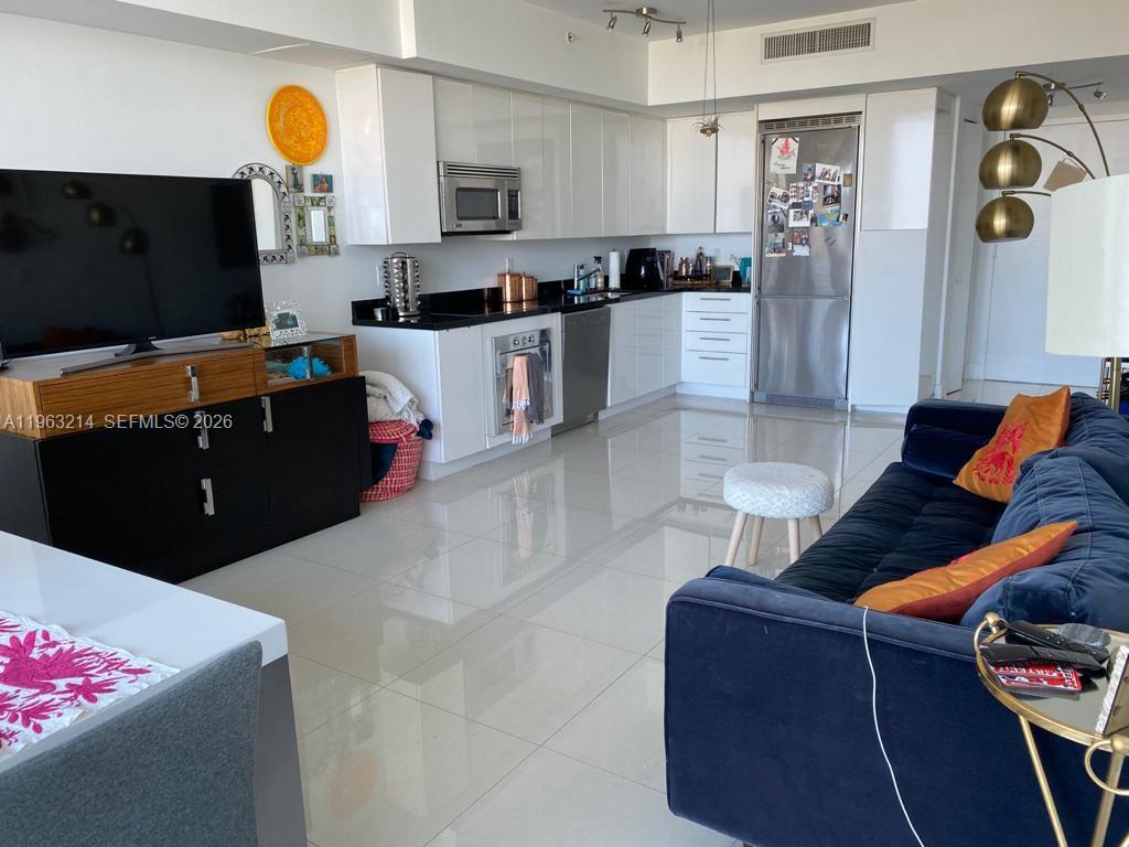 Amazing views of Miami from this condo with 1 bedroom, 1 full bathroom and 1 half-bathroom. Wraparound balconies encompass 789 square feet under A/C where you can enjoy spacious master bedroom and walk-in closet, ample living and dining areas, excellent finishes, porcelain flooring, SS appliances, and washer & dryer inside the unit. Rent includes basic cable, internet, one assigned and covered parking space and all amenities (pool, gym, clubhouse, etc). Located at THE MINT condo, just steps Brickell City Center and driving minutes from everywhere.