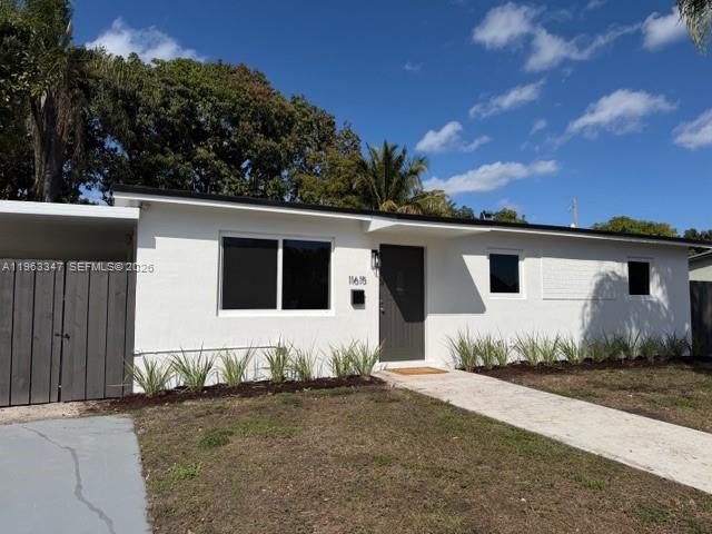 BEAUTIFULLY UPDATED GEM IS A TRUE MUST SEE!! LOCATION, LOCATION, LOCATION!! THIS MOVE IN BEAUTY HAS IT ALL!! NEW ROOF, NEW KITCHEN CABINETS WITH QUARTZ COUNTER TOPS!!  NEW FLOORING THROUGHOUT THE ENTIRE HOME!! IMPACT WINDOWS!! UPDATED BATHROOM AS WELL. FRESHLY PAINTED INSIDE AND OUT!! WITH A POOL AS WELL!!  NEW A/C!! ON A LARGE LOT WITH A HUGE YARD!! RUN DON'T WALK!! IF YOU SHOW IT, YOU WILL SELL IT.