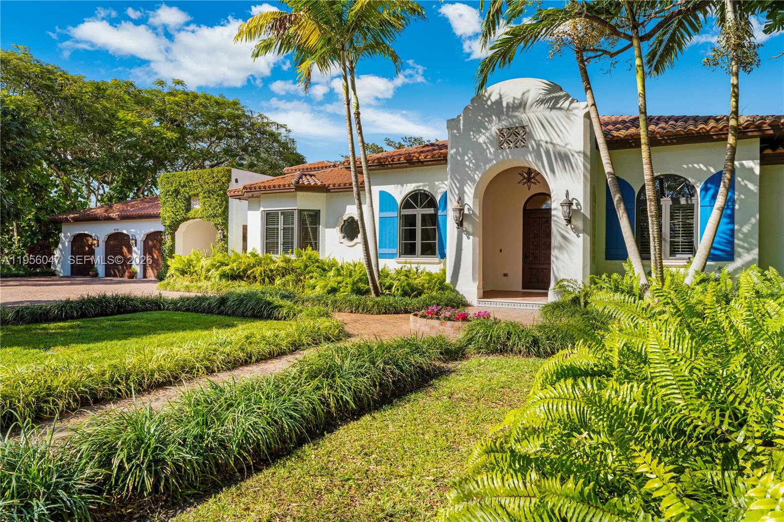 Welcome to Casa Azul! This timeless Santa Barbara–inspired Mediterranean retreat in North Palmetto Bay was custom-built in 2016 by its current owners and sits on a privately gated 54,000+SF estate east of Old Cutler Rd. Designed for modern living with exquisite details, the home features soaring 13–16' ceilings, expansive great room, oversized chef’s kitchen, wood and stone floors, quartzite counters, and custom chandeliers. Through a charming breezeway is a 3-car garage and GUEST HOUSE with private entrance, a living room, kitchenette, and bedroom/bath ideal for in-laws, teens, or home office. Outside, enjoy a resort-style pool, gazebo with bath, lush landscaping, and room for a tennis court. Steps from top schools, trails, and the bay. Luxury, design, and location in perfect harmony.
