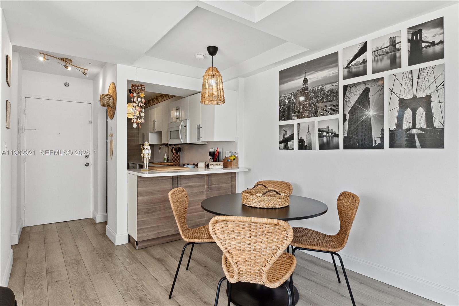 Modern kitchen with designer features at 1255 Collins Ave - Condo in Miami Beach