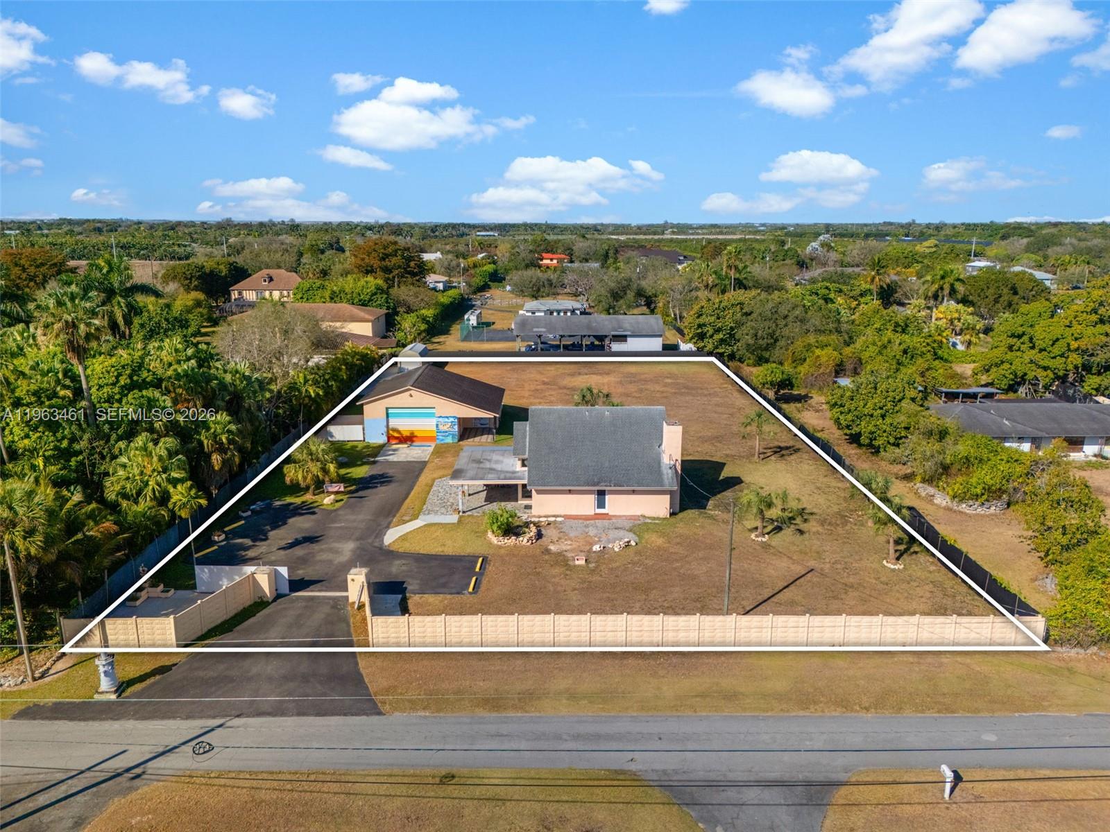 Experience true South Florida charm on this 1.32-acre property featuring a single family home plus a detached garage/storage building, perfect for a workshop, equipment, or additional space for hobbies. Inside, you’ll love the abundance of natural light that fills the home, enhanced by impact windows, creating a bright and inviting atmosphere throughout. Major upgrades include a brand-new roof and TWO new A/C units, giving peace of mind and energy efficiency. With NO HOA, enjoy the freedom to park your boat, RV, or work trucks with ease. There’s plenty of room to build the pool of your dreams, expand, or create your own private outdoor retreat. Located in the highly desirable Redlands area, offering privacy and country living while still being just a short drive to the Florida Keys, shopping, and dining. If you’ve been searching for acreage, natural light, privacy, and modern upgrades, this is the opportunity you’ve been waiting for.