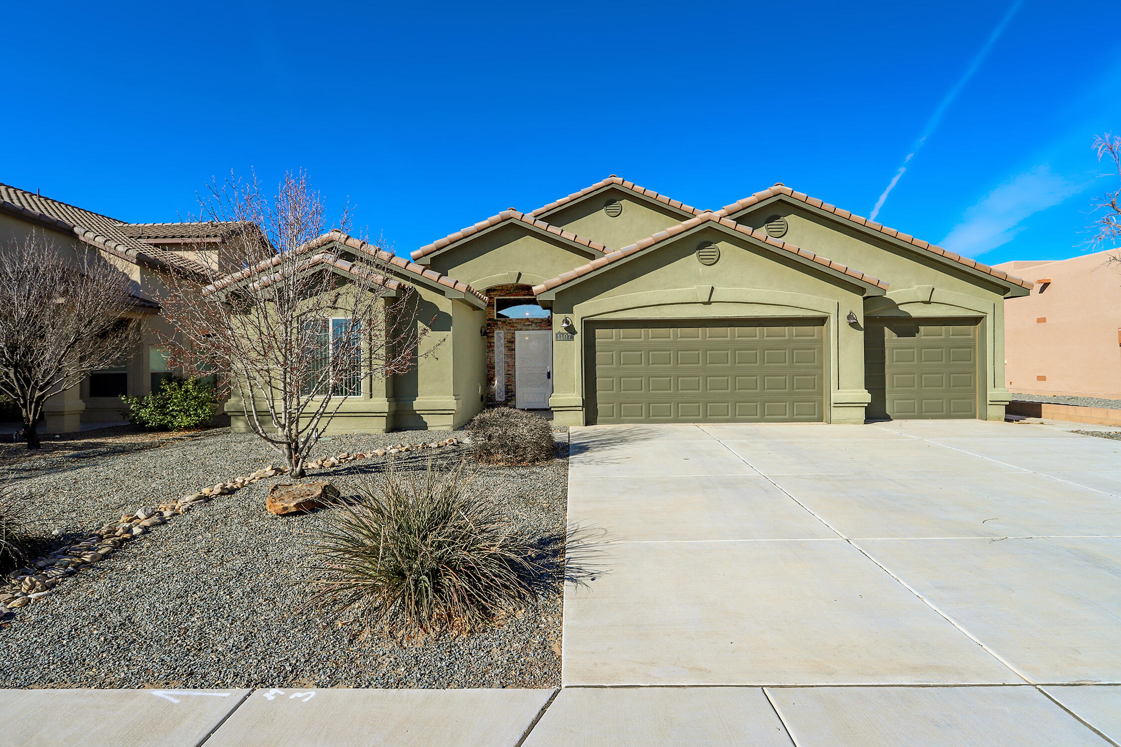 Welcome to this beautiful single-story home offering comfort, accessibility, & thoughtful upgrades throughout, all with NO HOA and NO PID! Striking stackstone entry invites you into the open concept floorplan with tall ceilings & abundant natural light from skylights, this home feels both spacious & inviting. Spacious kitchen w/ granite countertops, custom cabinetry, & seamless flow into the living area complete w/ cozy gas fireplace. Designed with accessibility in mind, the home includes two ADA-accessible bedrooms & an ADA-accessible bathroom. Primary suite offers large walk-in closet, double vanities, & bathroom complete with separate tub & shower. Enjoy the covered back patio w/ a gas stub-out ready for BBQs, ideal for outdoor gatherings. Rare 3-car garage for ample storage & parking.