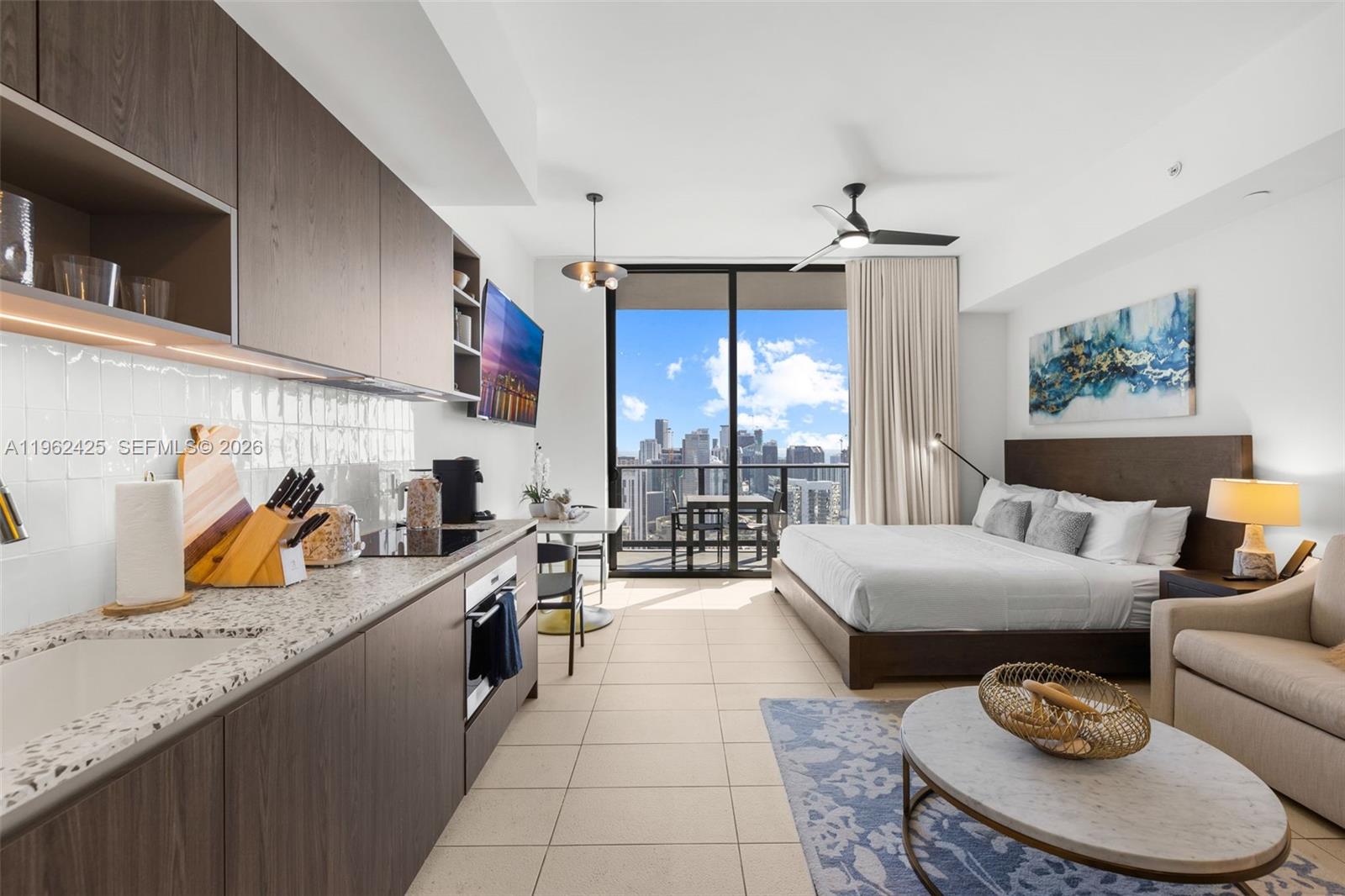 Turnkey studio residence at Natiivo Miami offering unmatched flexibility and income potential in the heart of Downtown. Fully furnished and thoughtfully designed, this high-floor unit features a sleek open layout, floor-to-ceiling impact glass, and sophisticated modern finishes throughout. Purpose-built for short-term rentals with no restrictions, owners can rent daily, weekly, or monthly, making it an exceptional investment opportunity or luxury pied-à-terre. Residents enjoy resort-style amenities including a panoramic rooftop pool with cabanas, state-of-the-art fitness center, spa, co-working lounges, restaurant and bar service, private event spaces, 24-hour concierge, and valet. Ideally located steps from Miami Worldcenter, Kaseya Center, Brightline, Bayside, Museum Park, and the Adrienne Arsht Center, this is true urban luxury with built-in upside.