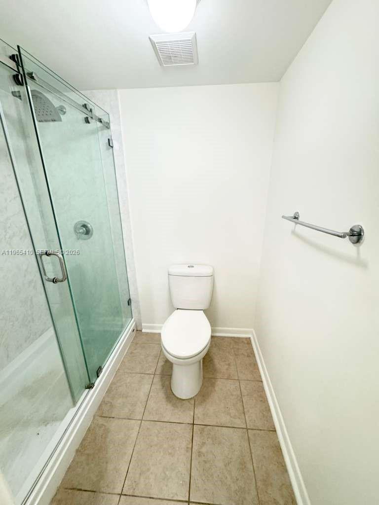 Elegant master bedroom retreat at 1715 Village Blvd - Condo in West Palm Beach