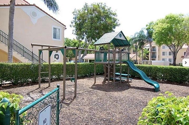 Elegant master bedroom retreat at 1715 Village Blvd - Condo in West Palm Beach