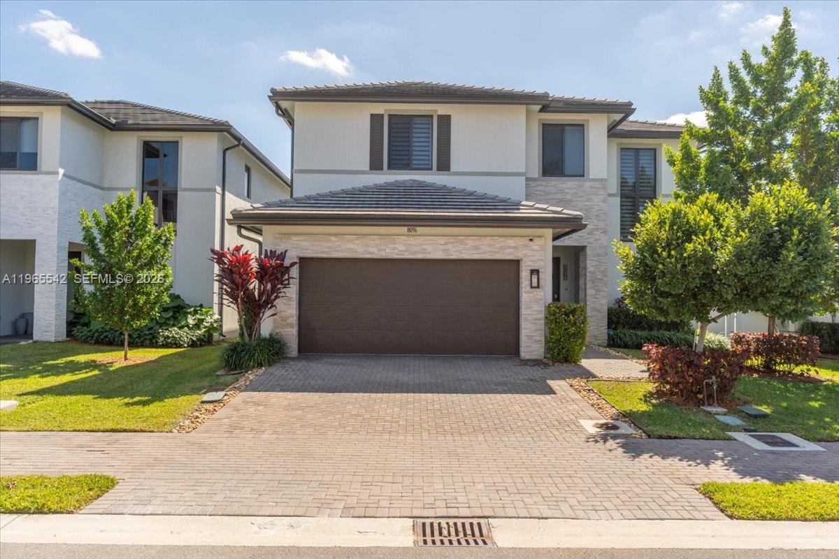 Enjoy the amazing lifestyle at Doral Downtown in a modern 4 beds + den, 3 baths in a 2-story house with a Pool. Fully upgraded and meticulously designed. Open-concept, clean layout with high ceilings throughout, luxury light fixtures, impact windows with custom electric zebra blinds/blackouts, tons of light. Modern kitchen with electric stove, quartz countertops, custom cabinetry and walk-in pantry. Title in the first floor, vinyl in all beds and stairs. Custom cabinets in all rooms. Laundry room with upgraded washer/dryer, quartz countertop, cabinetry and sink. Master bedroom has a large walk-in closet with custom cabinets, luxury bathroom with large shower. One bed and full bath on the first floor. Automatic 2-car garage with epoxy flooring and cabinets, plus 2 spaces in the driveway, guest street parking. Electric water heater. Backyard with modern pool, designer landscaping, fully tiled. State-of-the-art clubhouse: 2-story fitness center with kids play area, pool, sun deck, basketball court, running track, dog park, water splash playground, game room, pool table room, party room and much more. Walk to excellent bilingual charter elementary, middle and high schools (Spanish, Portuguese or French), parks, restaurants, bars, Publix, shops, Doral Art Center, UM Medical, Baptist and more. Close to Doral City Ctr, Shoma Bazaar, Dolphin Mall, Trump Golf Course, Marshalls/HomeGoods, JMH and more.