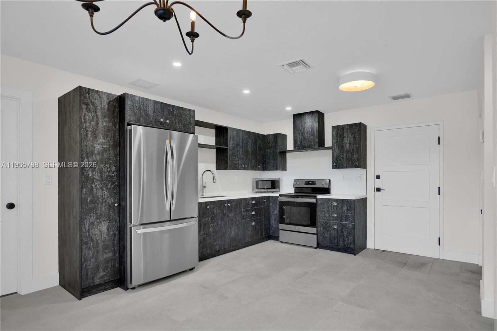Open-concept living area at 5980 40th Ave - Luxury Estate in Dania Beach