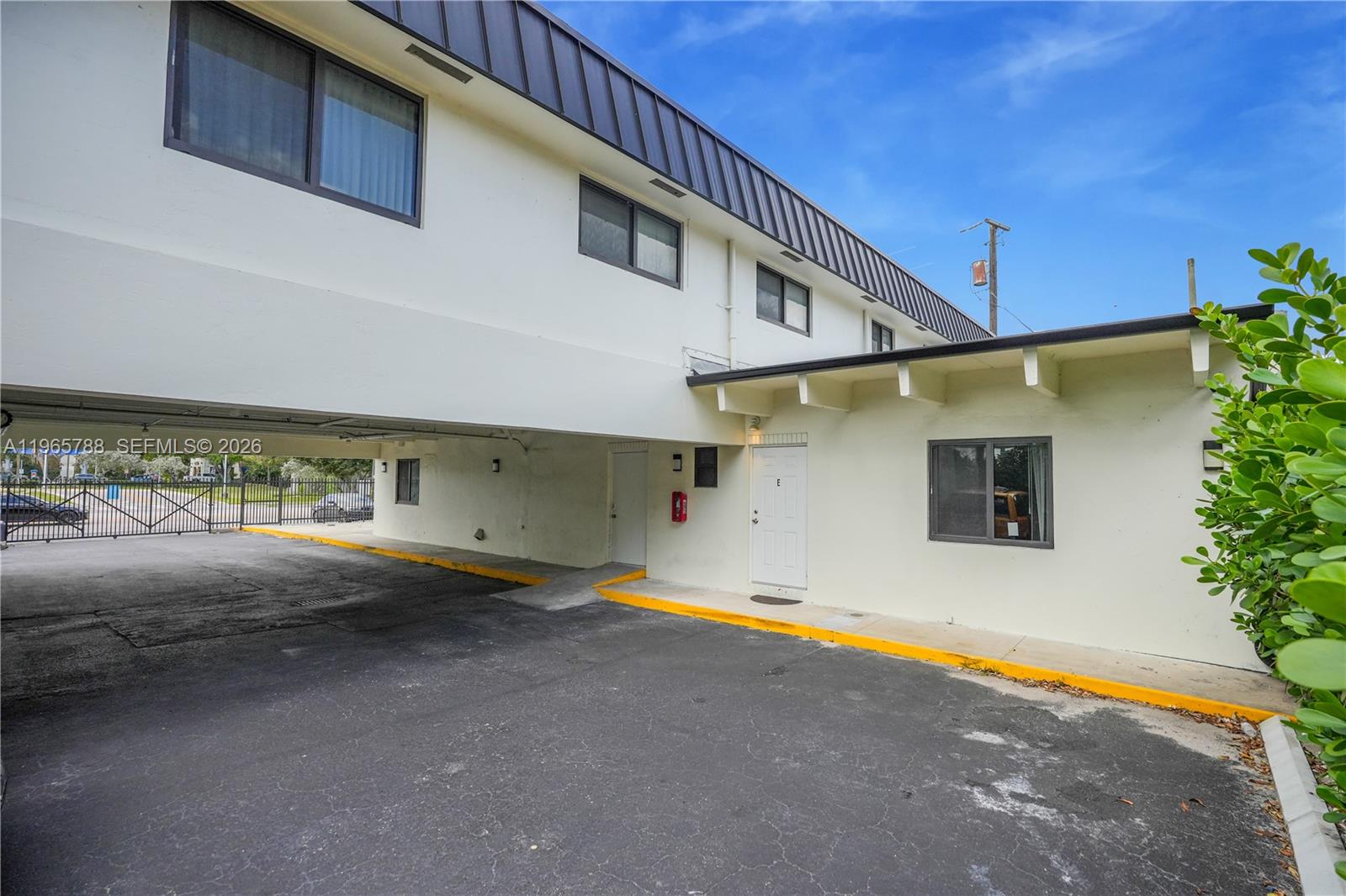 Well-appointed guest bedroom at 5980 40th Ave - Luxury Estate in Dania Beach