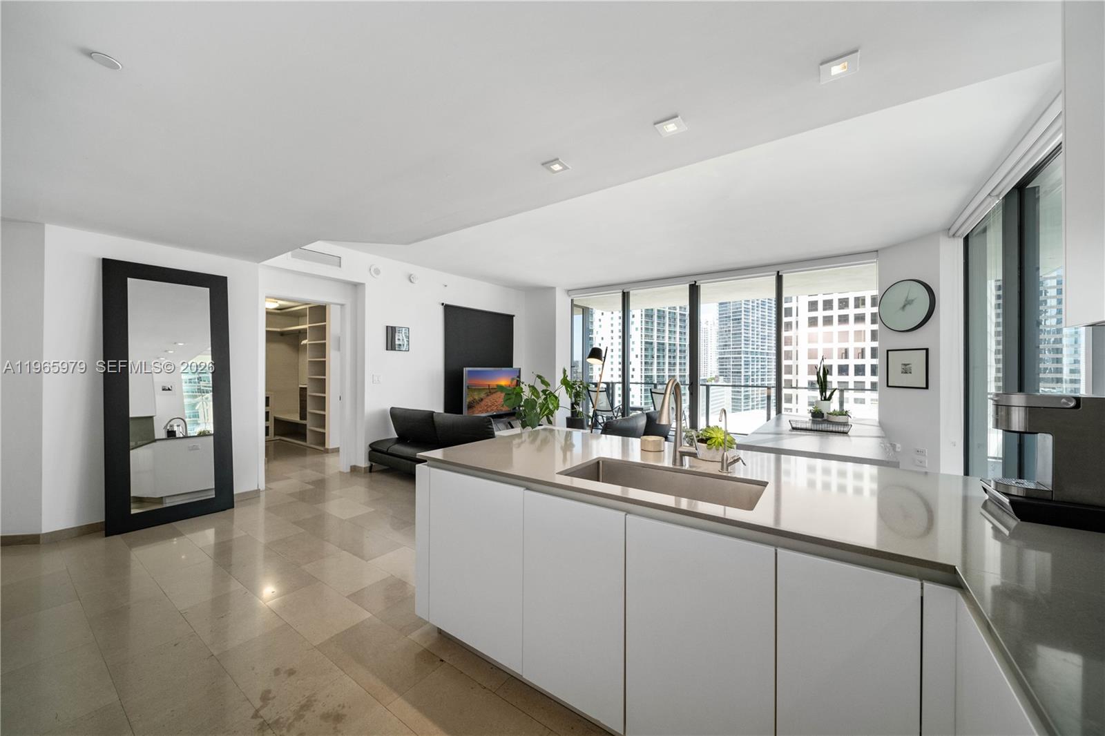 Corner residence in the desirable 01 line at Reach at Brickell City Centre, built in 2016. Located on the 12th floor and offering 1,265 SqFt, this 2-bed, 2.5-bath split layout is priced at approximately $790 per SqFt, representing a competitive value in today’s Brickell condo market. No special assessments.This corner unit features floor to ceiling glass, abundant natural light, and an expansive balcony ideal for indoor outdoor living. The thoughtfully designed split floorplan offers privacy between bedrooms, a spacious primary suite with walk in closet and en suite bath, a secondary bedroom with its own full bath, plus a convenient powder room and in unit laundry.Reach offers resort style amenities including heated pool, state of the art fitness center, spa, concierge, 24/7 security, and direct access to Brickell City Centre shopping and dining.An attractive opportunity for both end users and investors seeking a well positioned Brickell condo in a prime urban location.