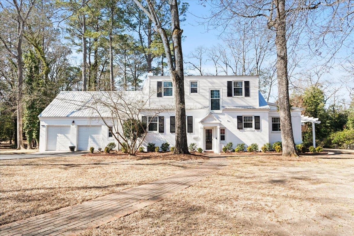 Welcome to timeless charm in the heart of Cheraw SC! Built in 1945 and thoughtfully updated, this beautifully maintained home offers approx. 2379 sq ft of character, space and modern comfort - all situated on a generous .76 acre lot.  Step inside to find three spacious bedrooms and 3.5 baths, providing room for family, guests, or multi-generational living.  Recent updates blend seamlessly with the home's historic details preserving the architectural charm and craftsmanship you love about classic homes while offering the conveniences today's buyers expect.  The kitchen features stainless steel appliances and countertops, creating a clean, functional space perfect for everyday living or entertaining.  Multiple living areas provide flexibility for gathering, relaxing or working from home.  Additional highlights include:  Basement for storage or expansion potential, two car garage with a convenient half bath, expansive yard with mature setting, updates completed while honoring the homes original character.  If you appreciate solid construction, thoughtful updates and the warmth of a home with history 607 3rd St delivers!