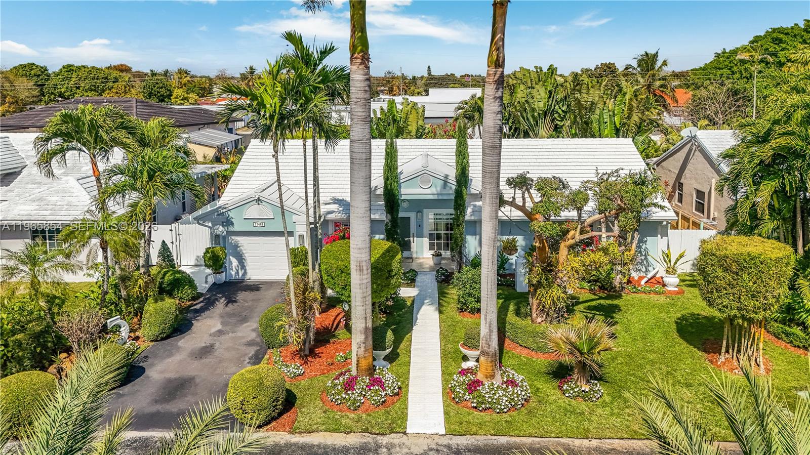 Beautifully maintained single-family home located in one of Kendall’s most desirable and sought-after communities. Britannia is a well-maintained, gated, and elegant community. Situated on an expansive 7,500 SF lot, this exceptional home reflects pride of ownership with meticulous care and refined upgrades throughout. The kitchen features elegant porcelain countertops and quality high cabinets with new stainless steel appliances, remodeled bathrooms (2025), elegant ceramic flooring, and a spacious primary suite with a custom Armani-style walk-in closet design. Major systems have been recently updated, including a new A/C and new water heater offering peace of mind to the next owner. The outdoor space is equally impressive, highlighted by a spacious patio and a beautifully curated garden with vibrant florals, a sprinkler system, and a serene backyard ideal for entertaining or private relaxation. Additional enhancements include aluminum and rainbow gutters, blending durability with refined design. The well-managed HOA provides a welcoming yet secure environment with gated security and patrol. Residents enjoy beautifully maintained amenities, including a pool, tennis court, and playground, along with a friendly neighborhood ideal for walking, running, and enjoying an active lifestyle.. Prime location close to major expressways, shopping centers, and top-rated Grade A schools. This is a rare opportunity to own a move-in-ready home in an exceptional location. A must-see!