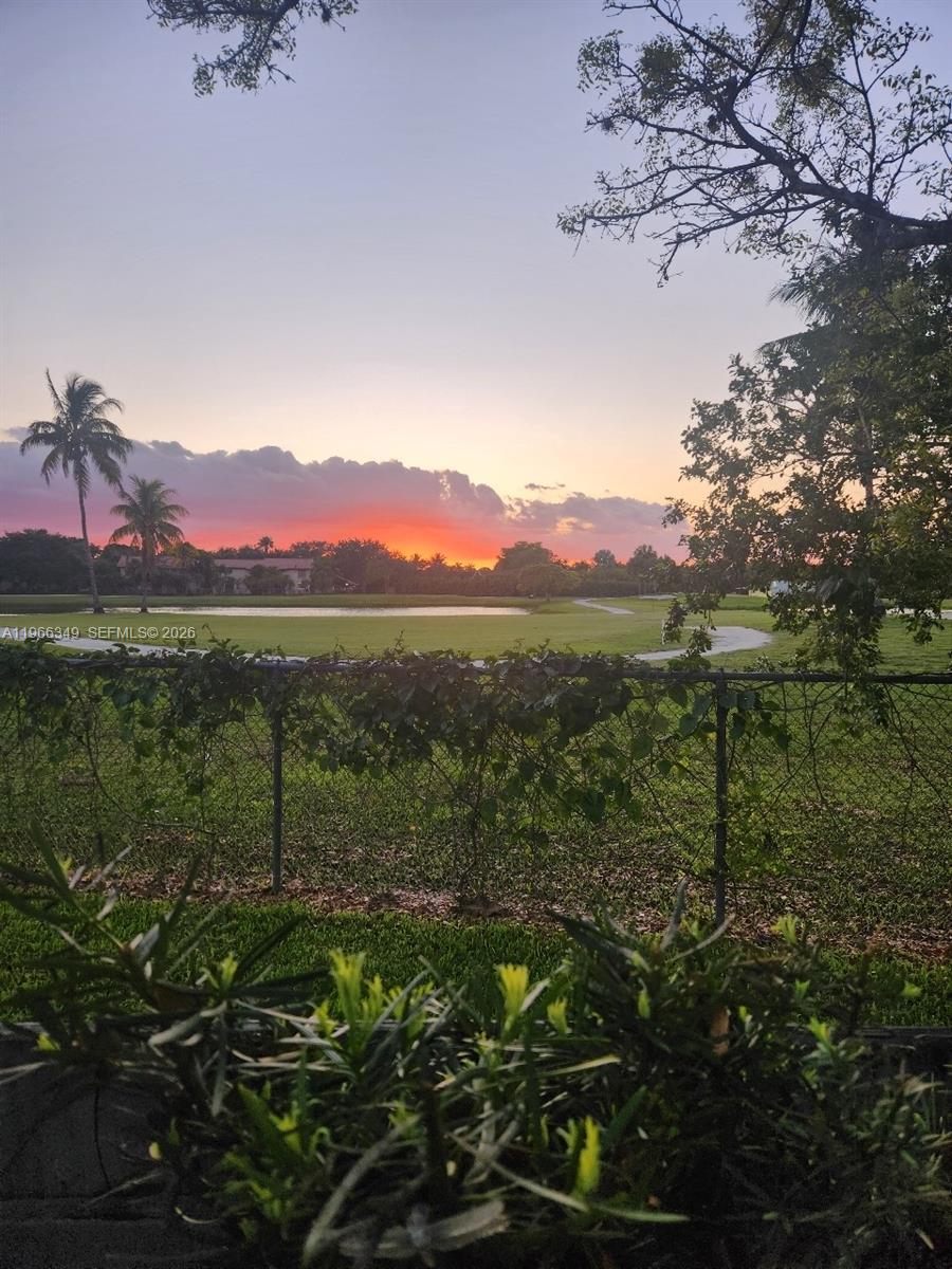 Desirable Briar Bay corner unit perfect for entertaining with breathtaking views of the pond and golf course. The nicely updated single-level townhome has vaulted ceilings, fresh interior paint, a remodeled primary bath, a new shingle roof, and new wool Berber carpet in both bedrooms. Design meets perfection with this Miami Gem! Close to The Falls Shopping Center. Low HOA fee is $385 semi-annually.