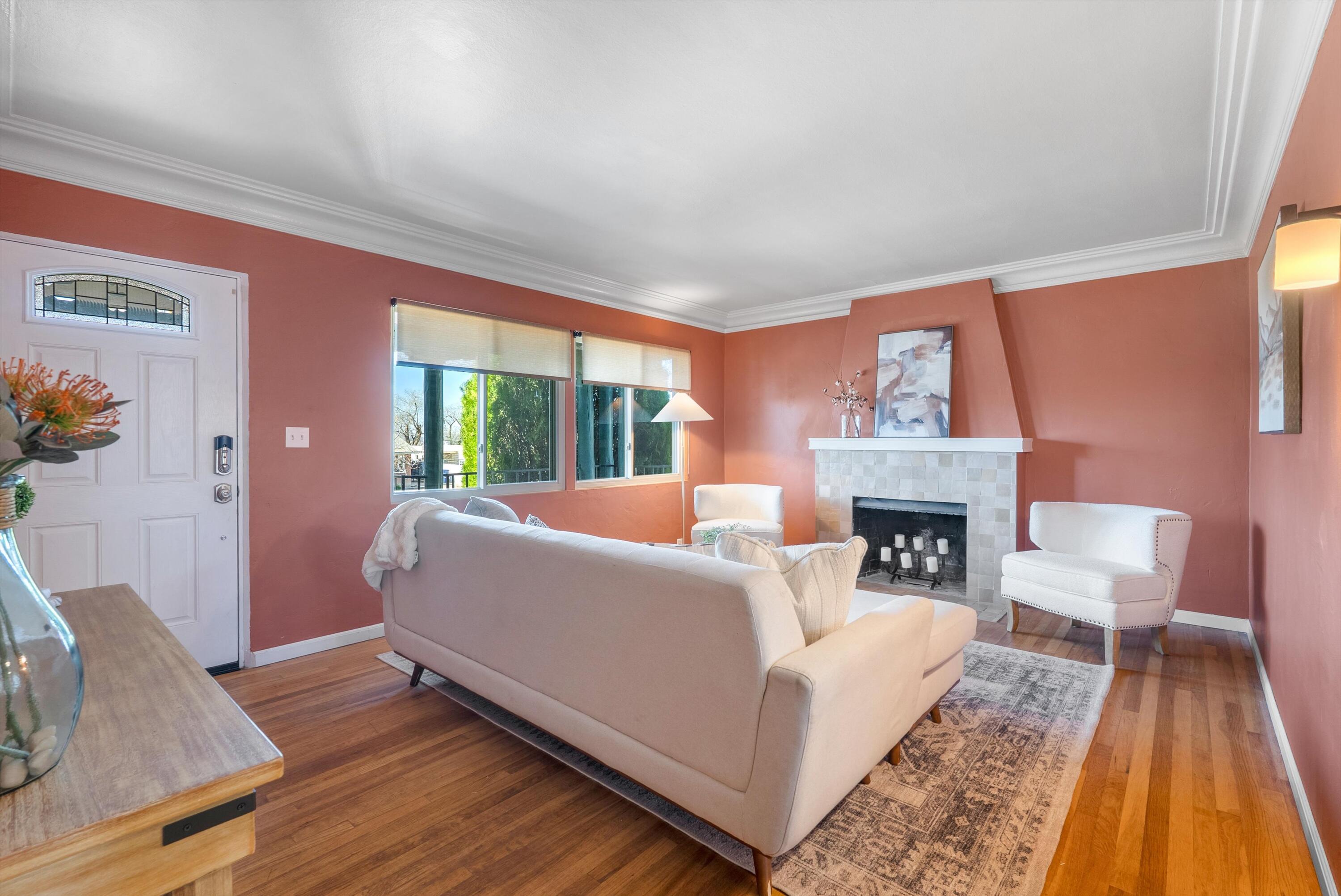 On a quiet, tree-lined Nob Hill street just blocks from Hyder Park, this charming home blends timeless character with thoughtful modern updates. The spacious kitchen features stainless steel appliances, an inviting island, and a generous pantry -- perfect for daily living and entertaining. Windows replaced in 2024 enhance energy efficiency and natural light, while a dual gas-electric HVAC system (2024) ensures year-round comfort. A recently renovated laundry room adds convenience.The expansive sunroom overlooks a secure, walled backyard with gated access and private parking -- ideal for relaxing or hosting guests.