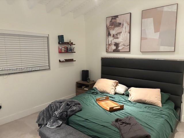 Well-appointed guest bedroom at 8837 4th Ave Rd - Townhouse in Miami Shores