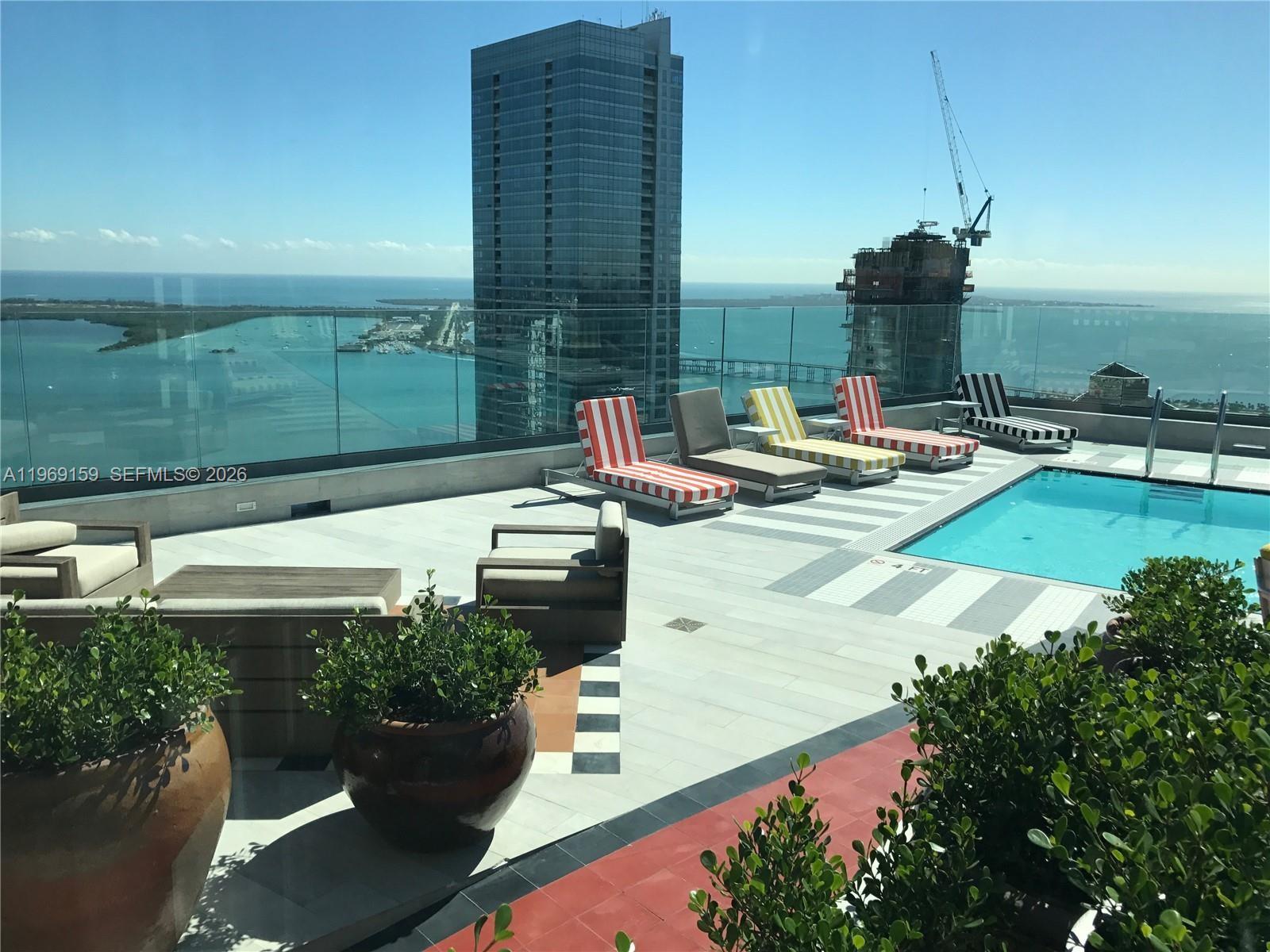 Spacious living room with panoramic views at 1300 Miami Ave - Condo in Miami