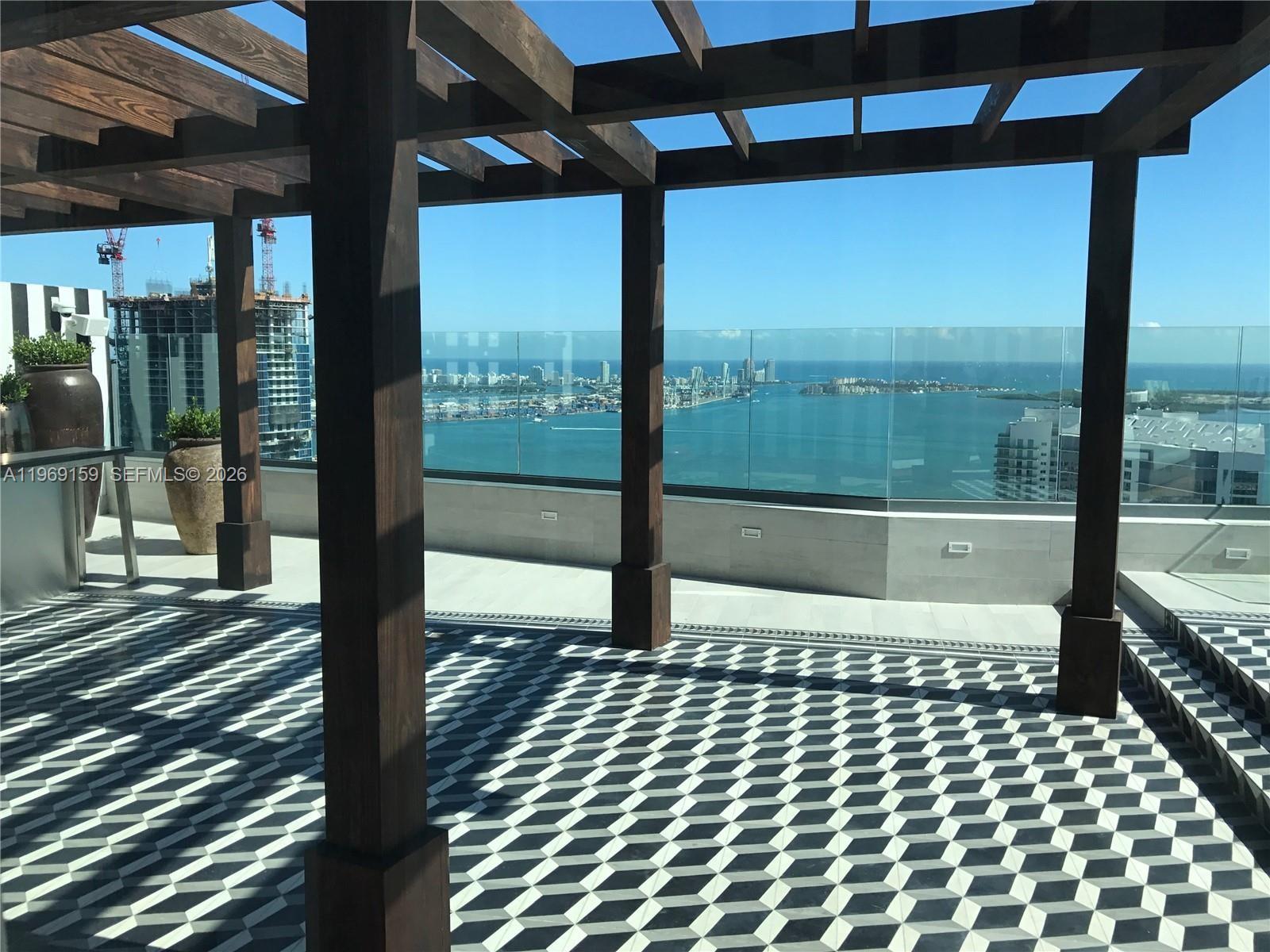 Modern kitchen with designer features at 1300 Miami Ave - Condo in Miami