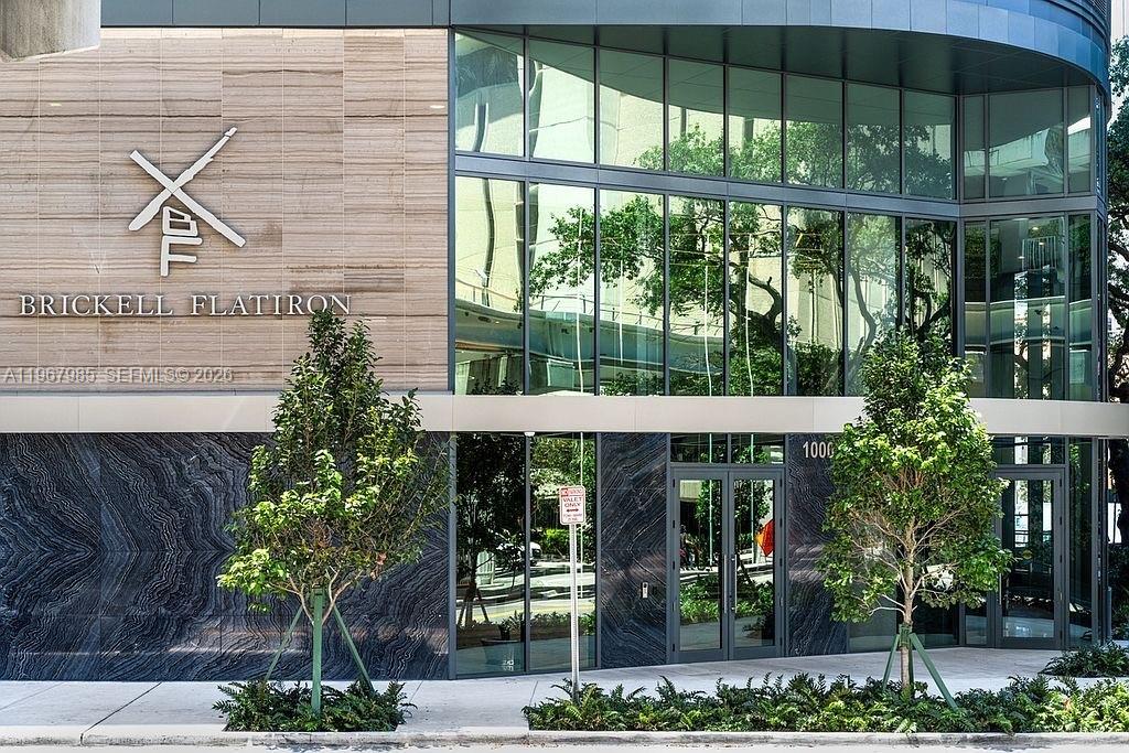 PH5304 at Flatiron Brickell is a rare trophy sky residence conceived by visionary developer Ugo Colombo, architect Luis Revuelta, and interior designer Massimo Losa Ghini. Spanning 2,418 square feet, this impeccably curated home showcases unobstructed ocean and skyline views with breathtaking sunsets. Originally a four-bedroom layout, the residence has been thoughtfully converted into three expansive bedroom suites, 4.5 baths, and a private den—creating a grand, open-concept living space that enhances light, flow, and scale. Buyers retain the flexibility to restore the fourth bedroom per the original floor plan. Floor-to-ceiling impact glass and 9-foot ceilings fill the home with natural light, complemented by custom closets, elegant cove lighting, and a state-of-the-art Italian kitchen ideal for entertaining. Amenities include a sky-level pool, spa and steam rooms, lap pool, fitness center, yoga and Pilates studio, children’s playroom, movie theater, 24-hour doorman, and concierge service. Offered fully furnished and meticulously maintained by its sole owner, this turnkey penthouse includes two assigned parking spaces plus valet, just steps from Brickell City Centre—defining elevated luxury living in Brickell, with premier dining, shopping, and vibrant nightlife just outside your door, along with easy access to major highways, Miami International Airport, and the city’s top financial and business districts.