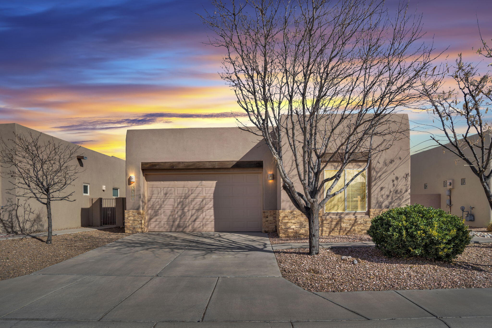 Welcome to 6608 Agave Verde NE, nestled in the highly sought-after Vista Del Norte subdivision. Tucked within the community's only gated enclave of custom homes, where properties rarely come to market. This exceptional residence offers both exclusivity and comfort. Originally the builder's model home, this beautifully appointed three-bedroom, two-bath property showcases luxury upgrades throughout, including radiant heated floors, high-end custom cabinetry, and a stunning dining area designed for both everyday living and elegant entertaining. Vista Del Norte is celebrated for its well-maintained homes, neighborhood parks, and prime central location. The active HOA thoughtfully preserves surrounding green spaces, including Vista Del Norte Park, one of the city's largest balloon landing sites