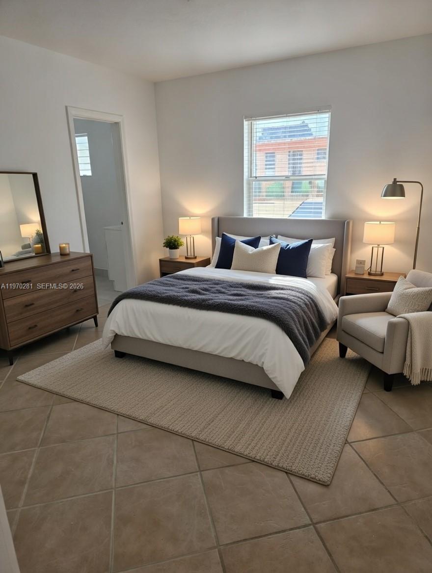 Well-appointed guest bedroom at 146 1st Ave - Home in Dania Beach