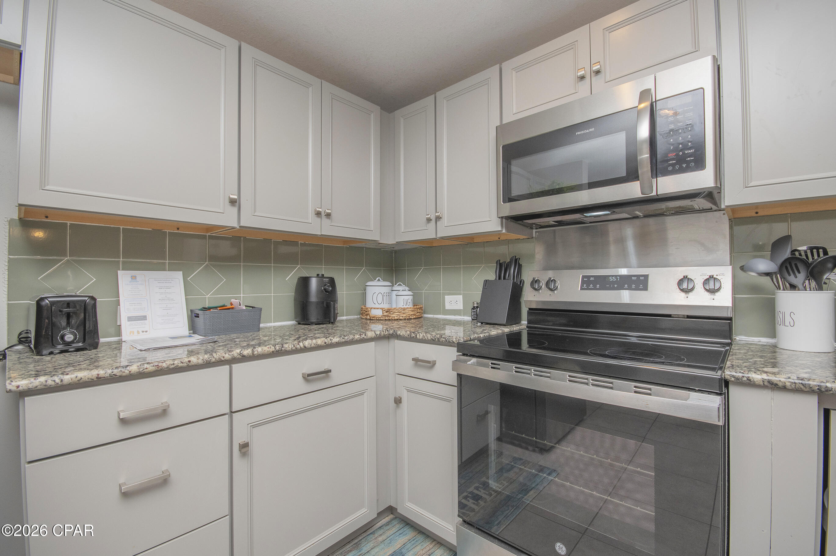 Image 17 For 11807 Front Beach Road 2003