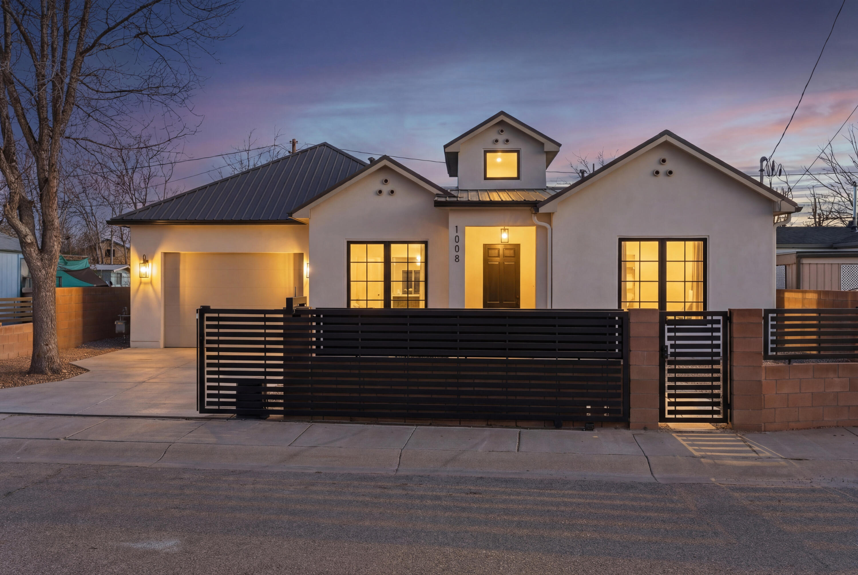 Perfectly positioned in the Sawmill area of Albuquerque, this 4-bedroom home offers a prime close-in location near Old Town Albuquerque, Sawmill Market, Hotel Chaco, and Hotel Albuquerque--with quick access to the city's best dining, culture, and major corridors.Designed for modern living, the home features energy-efficient systems, smart-home wiring, whole-home connectivity, and flexible spaces for entertaining or everyday comfort. Enjoy a 48'' gas range, built-in bar area, outdoor BBQ setup, and a finished epoxy garage. Thoughtful upgrades throughout and a highly desirable central location, this home offers convenience, function, and access to everything Albuquerque has to offer.