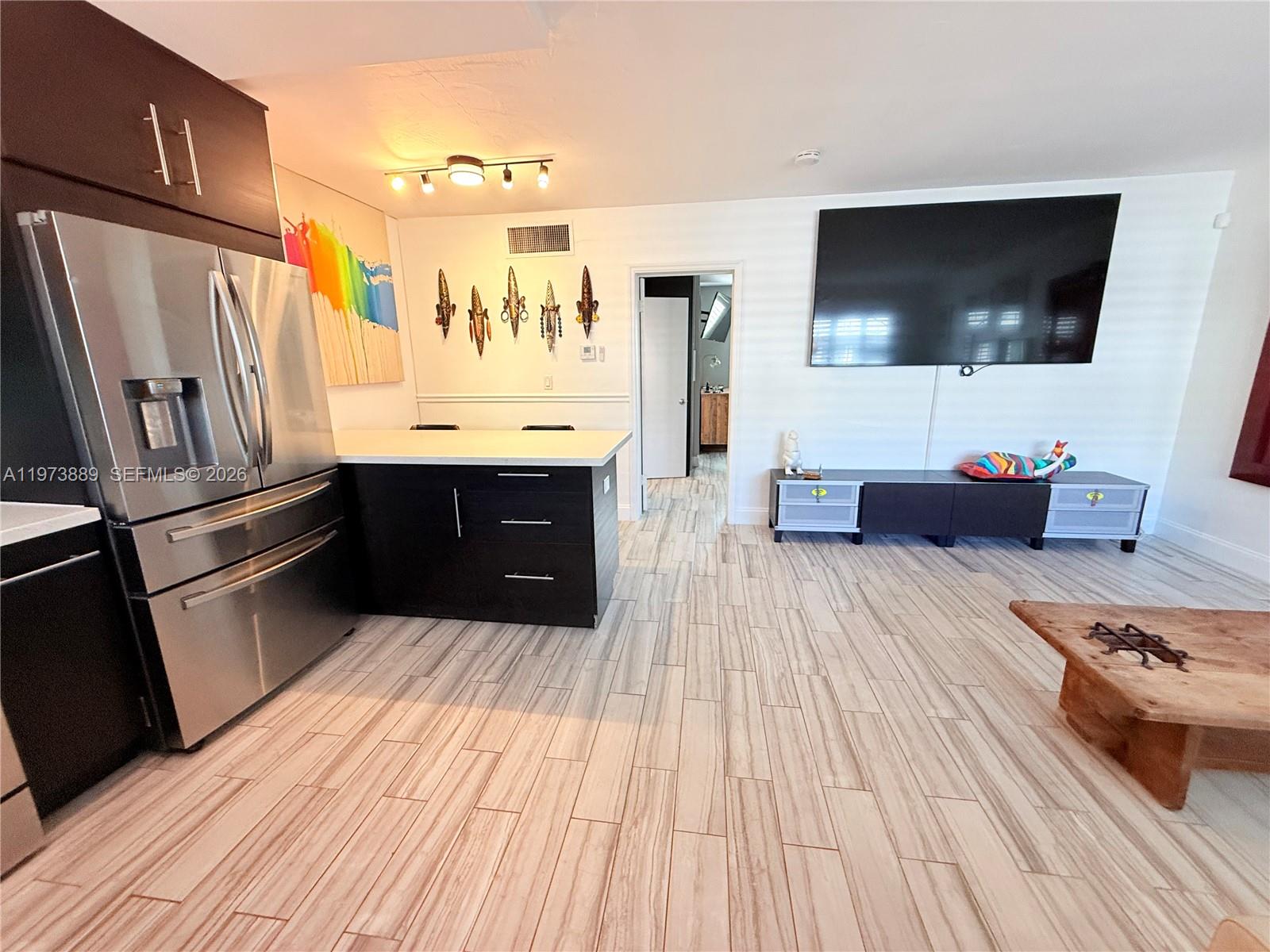 Recently renovated furnished apartment in sought after Coconut grove.  Located right in the middle of Center Grove, Waking  distance to Parks, restaurants, Gyms, Waterfront and more. New kitchen and bathroom. Move-in ready. Water included. Condo Building recently completed 40-yr recent with new roof, windows, doors, railings, paint. Text listing agent to show.