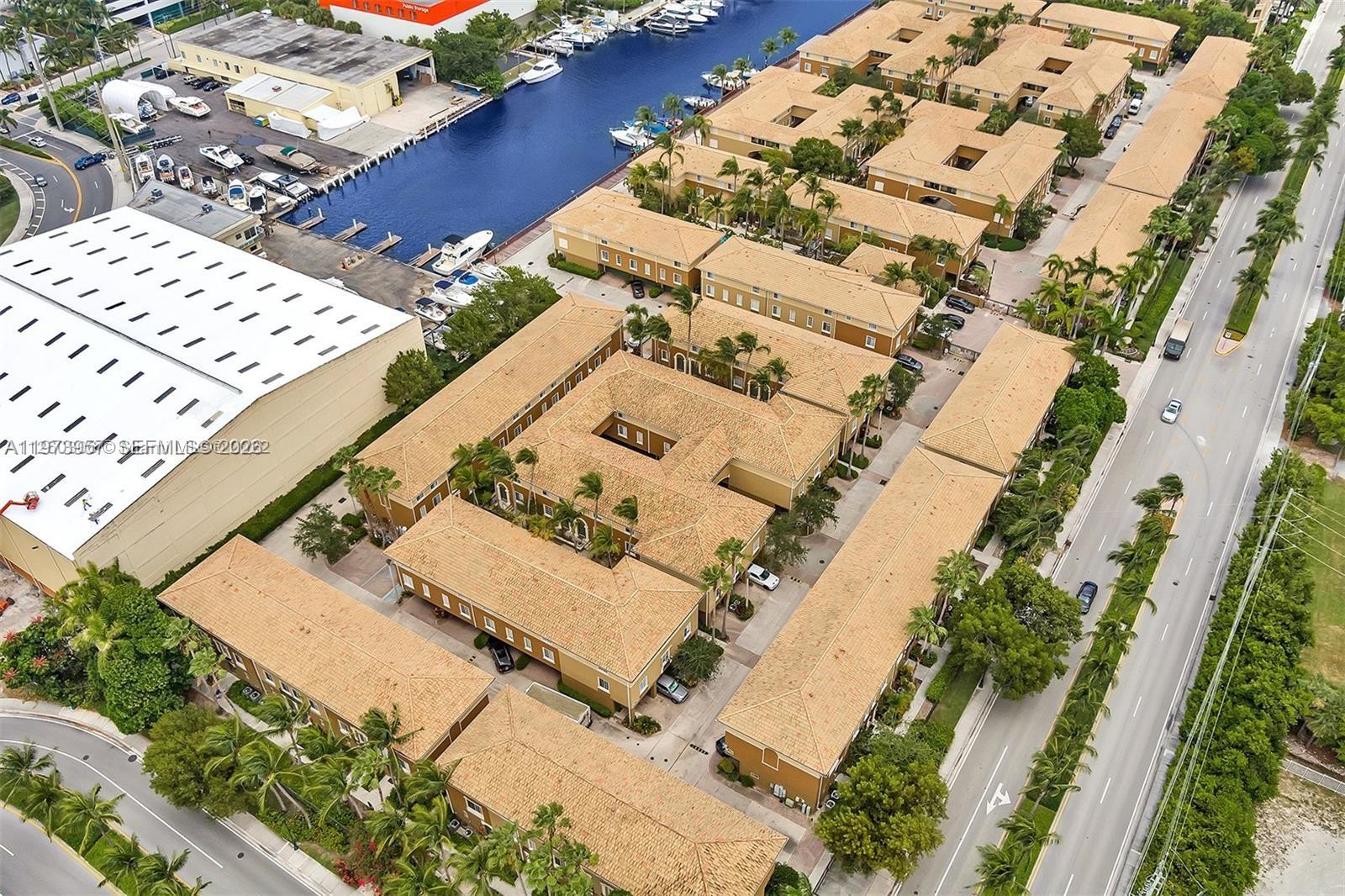 WATERFRONT CORNER UNIT WITH A BALCONY ONE OF A KIND IN COMMUNITY 3 STORY TOWNHOUSE 3 PARKING SPOTS , 2 CAR GARAGE , GREAT INVESTMENT WITH A TENANT INCLUDED ,TENANT PAYING $3450 , LONG TERM TENANT , PRICE TO SELL FAST