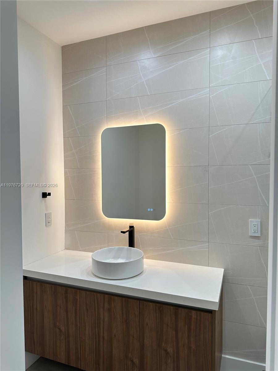 Well-appointed guest bedroom at 4655 32nd Ave - Townhouse in Dania Beach