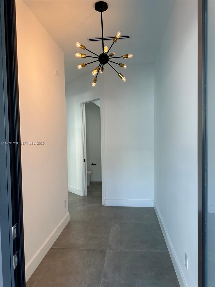 Modern kitchen with designer features at 4655 32nd Ave - Townhouse in Dania Beach