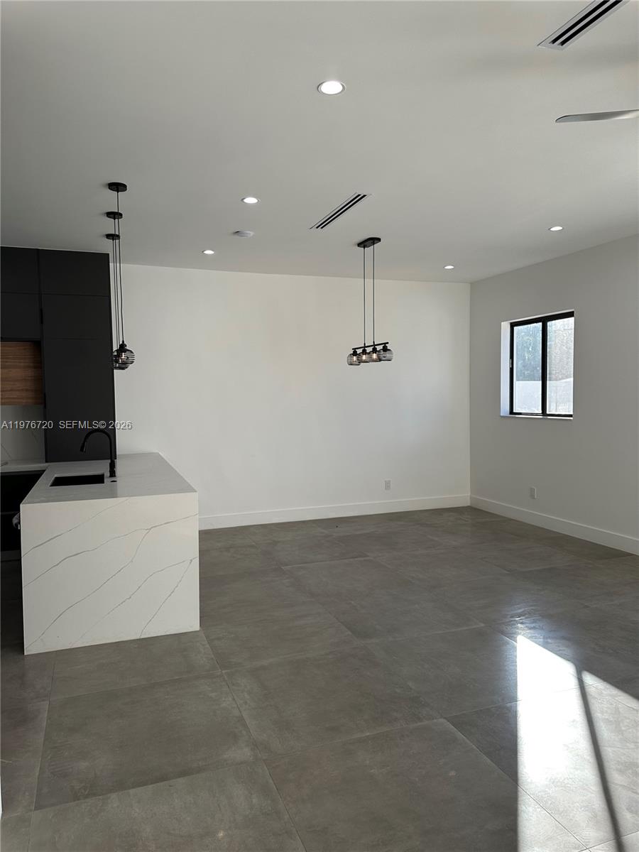 Well-appointed guest bedroom at 4655 32nd Ave - Townhouse in Dania Beach