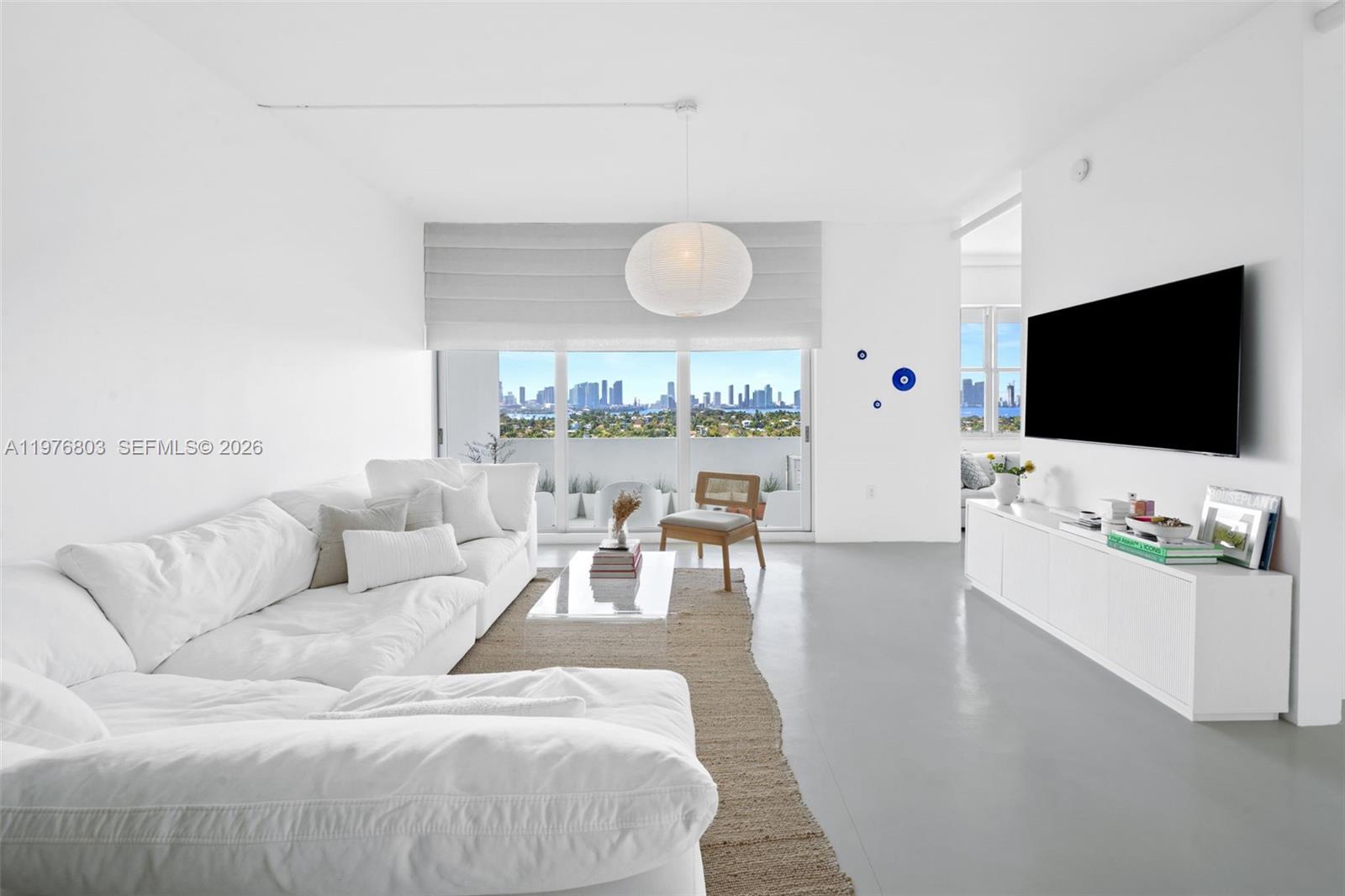 Spacious living room with panoramic views at 3 Island Ave - Condo in Miami Beach