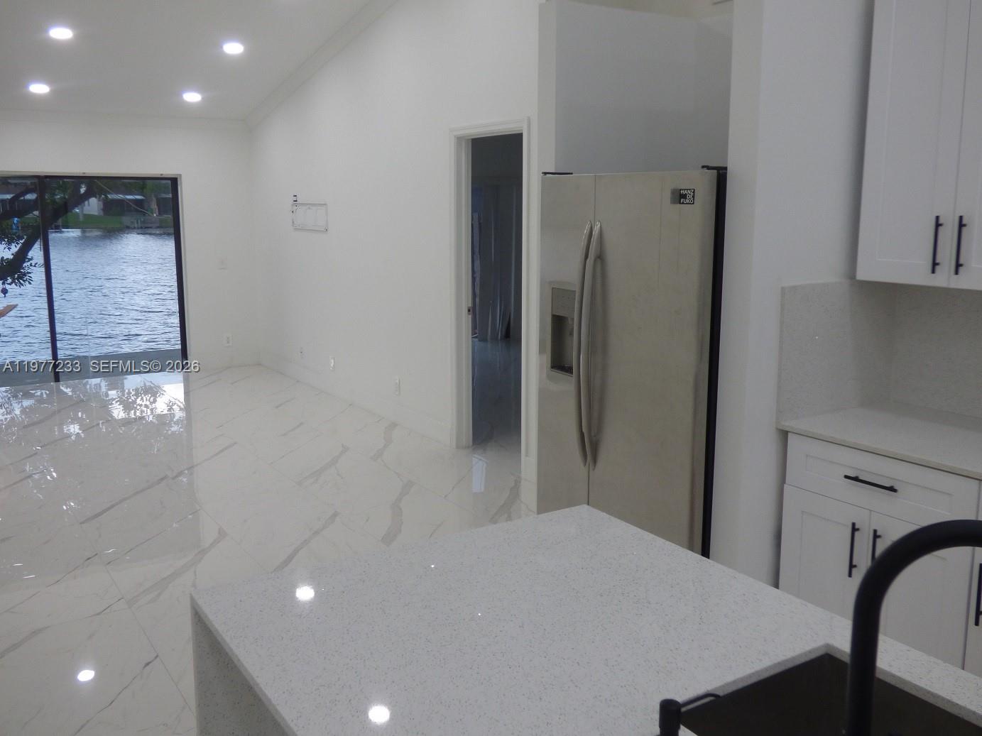 Well-appointed guest bedroom at 5643 Park Rd - Condo in Dania Beach