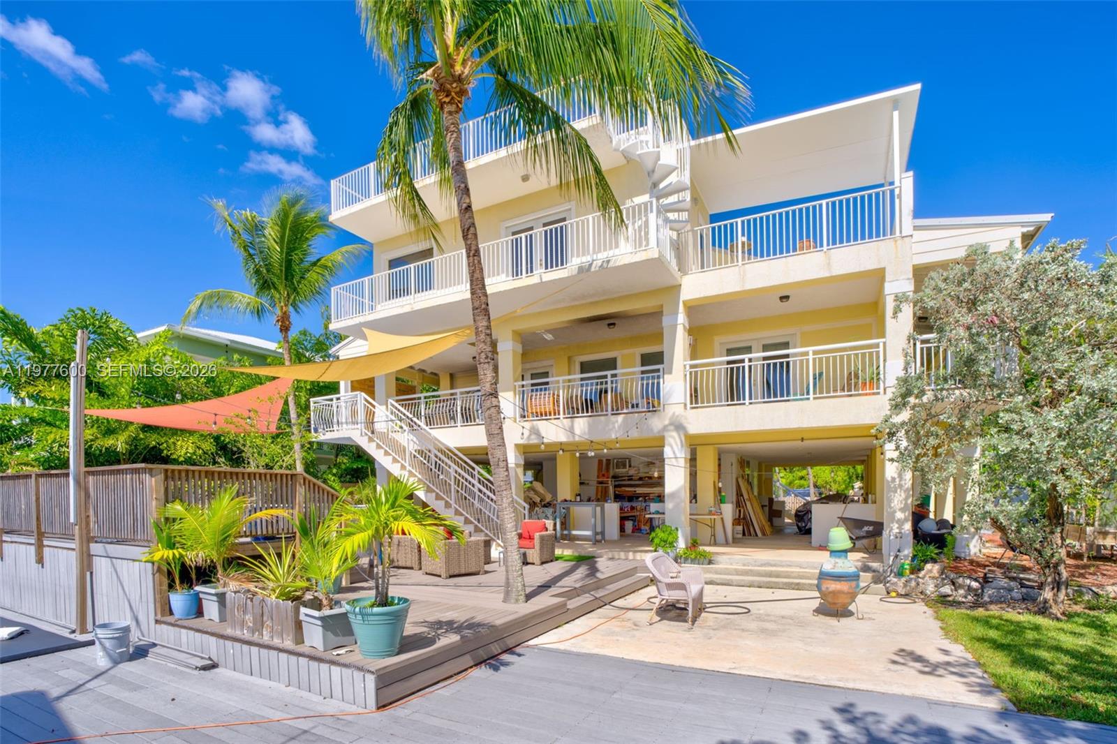 Stunning waterfront exterior at 894 Ellen Dr - Luxury Home in Key Largo