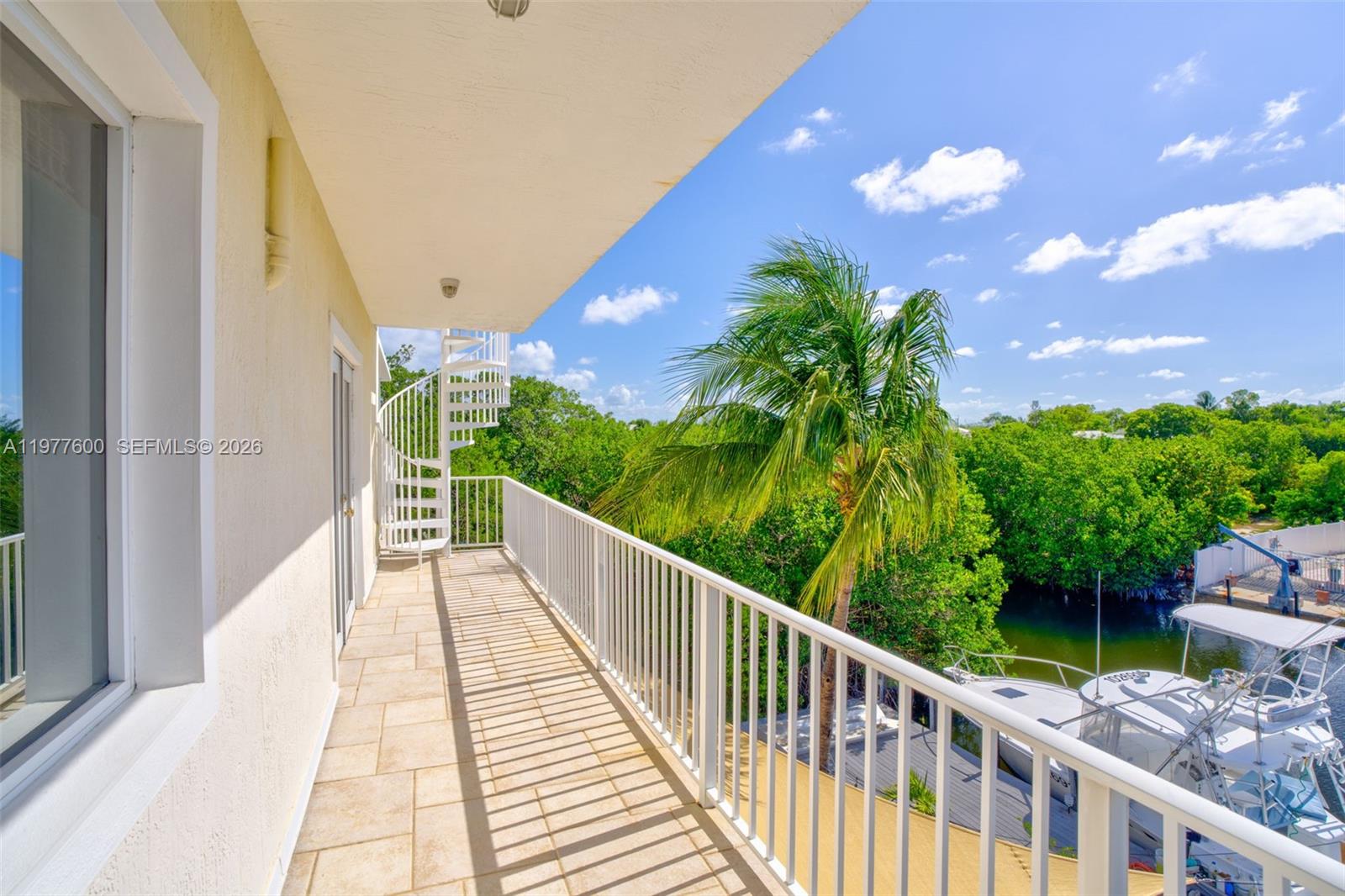 Elegant master bedroom retreat at 894 Ellen Dr - Luxury Home in Key Largo