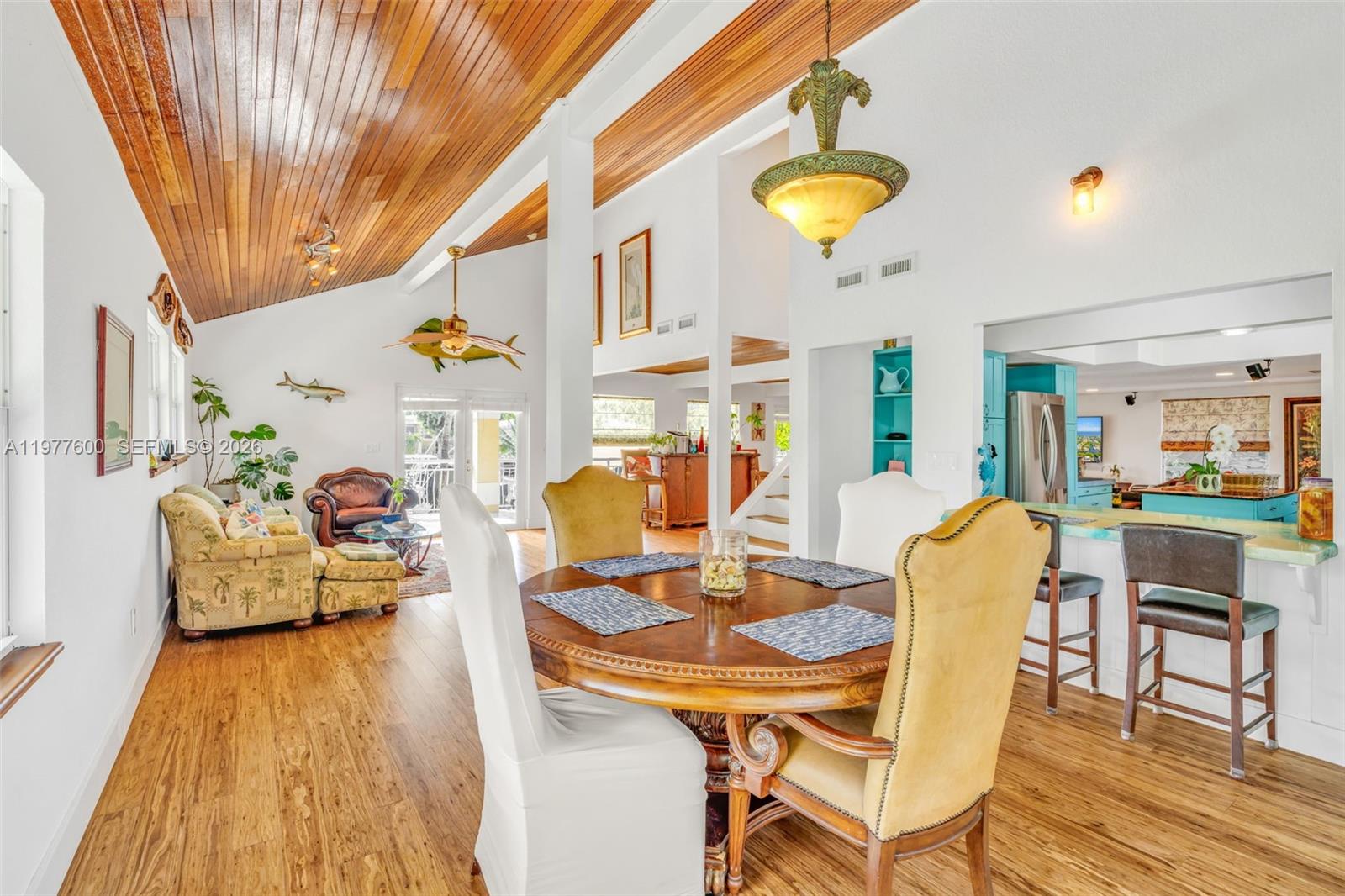 Spacious living room with panoramic views at 894 Ellen Dr - Luxury Home in Key Largo